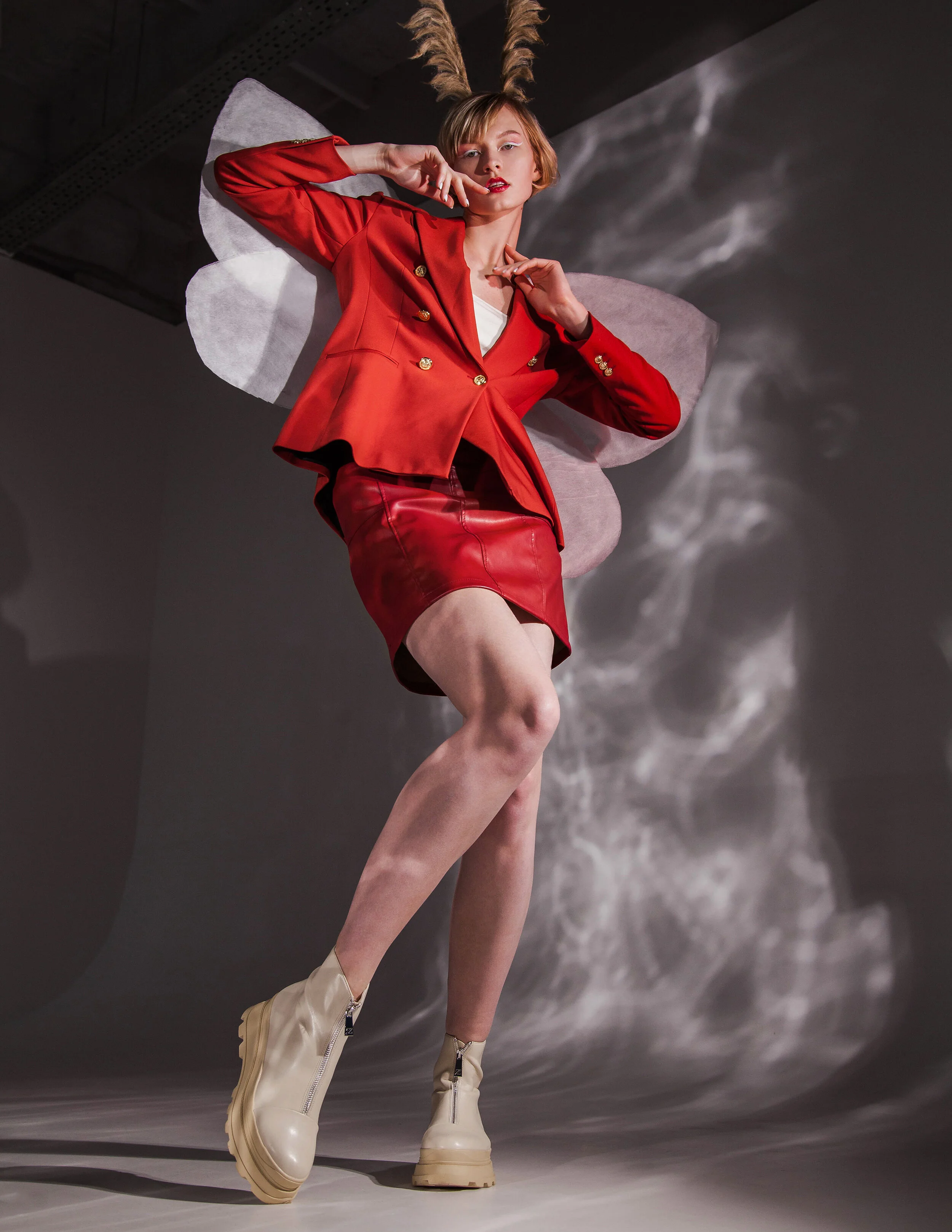 Wardrobe Stylist/Photographer/Retoucher: Nika Jakhaeva Female Model: Maria Klets Makeup Artist/Accessory Designer: Olesya Morgunova Wardrobe Credits: jacket, shoes,top: ZARA skirt: Mohito the wings and horns on the head are the property o
