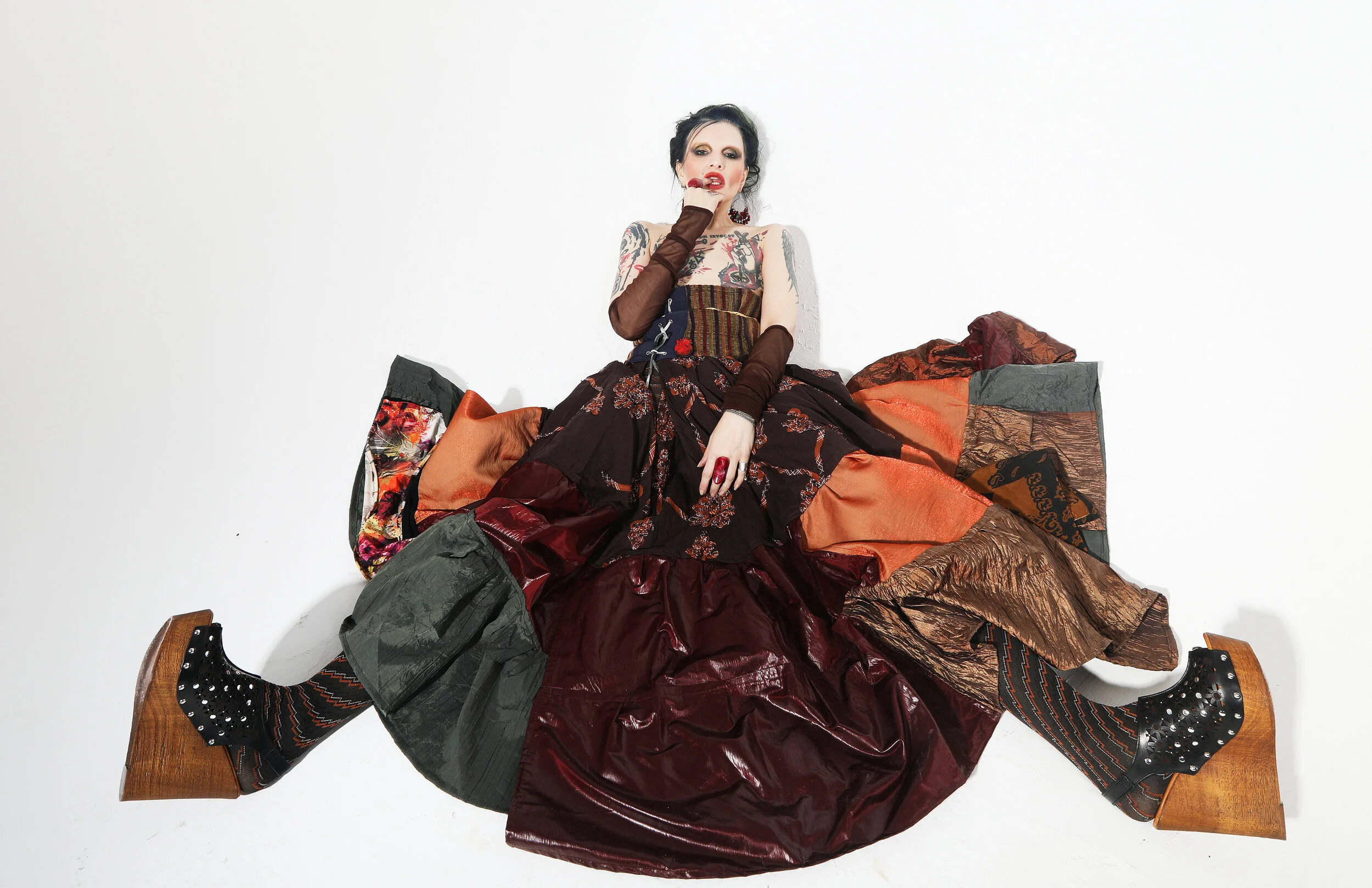 Photographer: Raisa Kanareva Fashion Designer, Slylist, Make-up and haire artist, Androgynous model: Alex No Wardrobe Credits: Skirt with corset, pelerine – A.No design Boots – Jolie Tights- Calzedonia Brooch – From the Depths Jewelry -