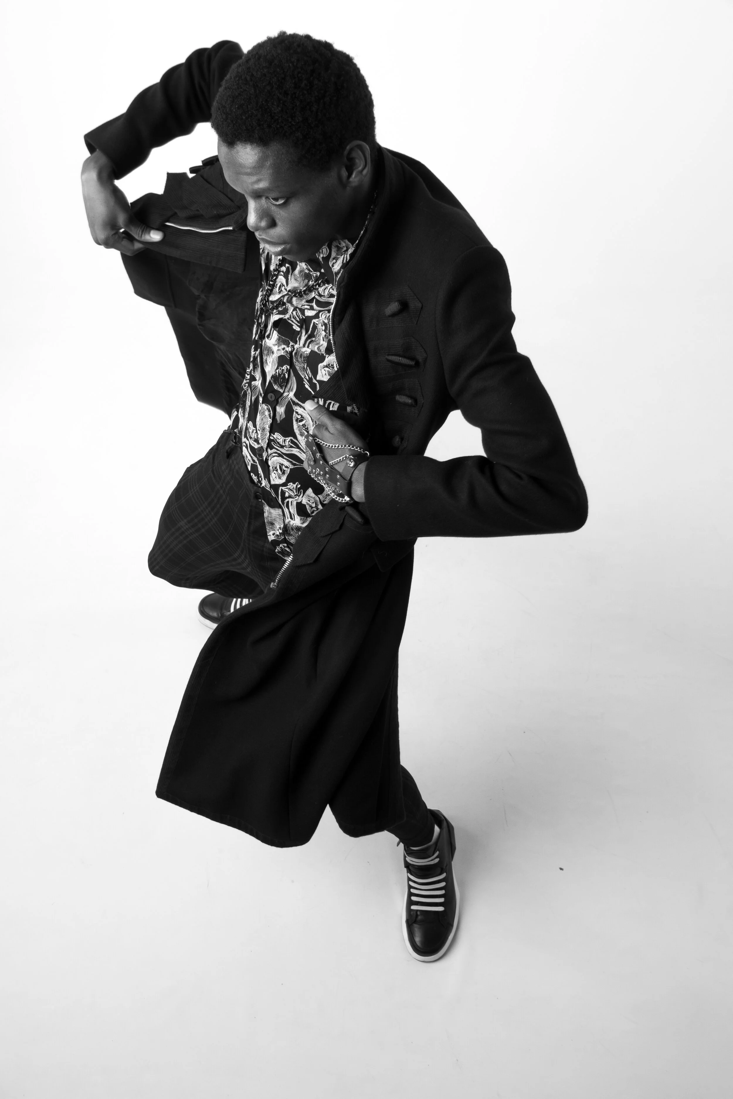 Photographer: Dario Tucci Wardrobe Credits: Black jacket : Gianbattista Valli for H & M Trousers & shirt : Zara Shoes : Cinzia Araia Necklace : yves saint laurent