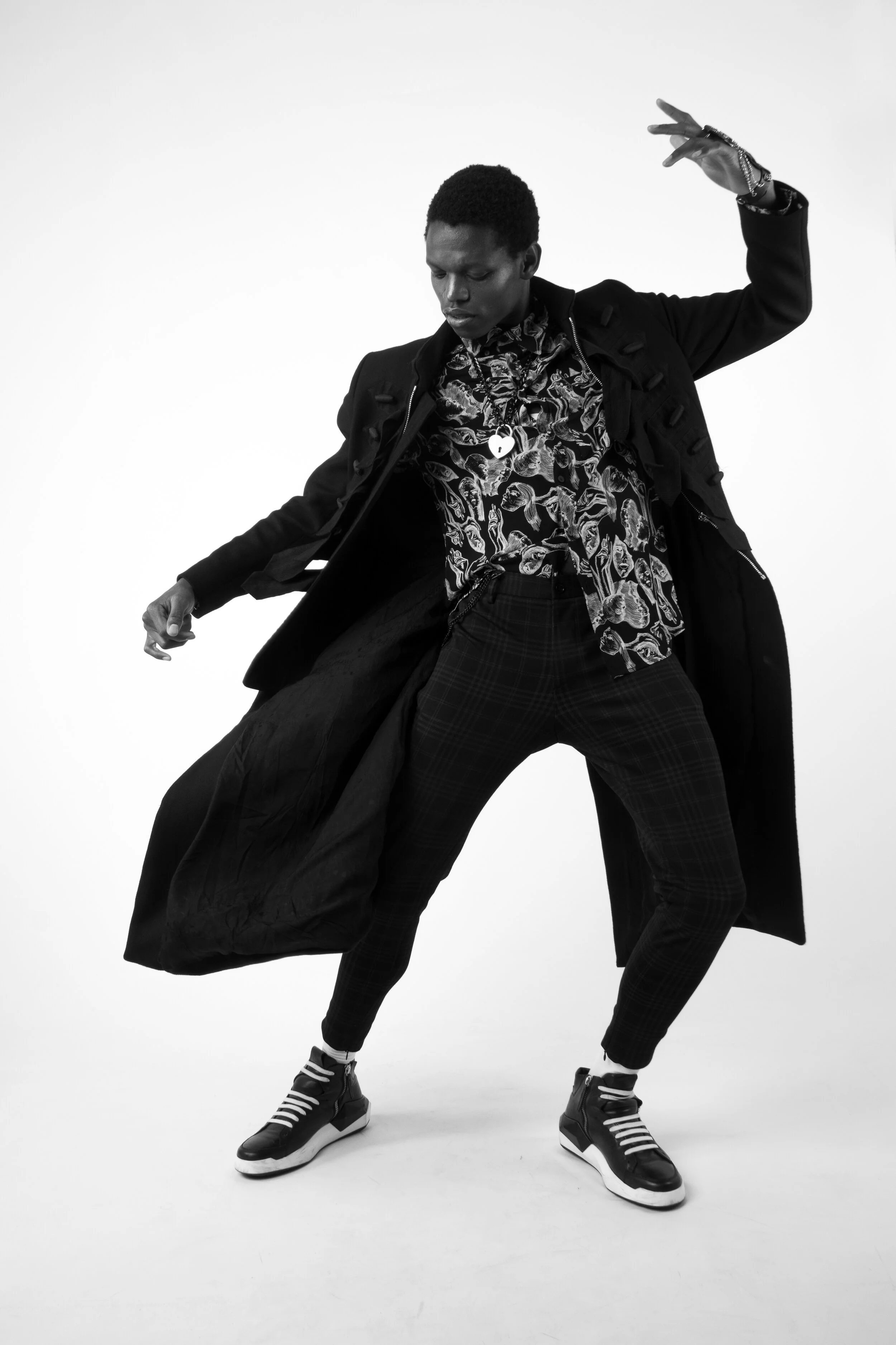 Photographer: Dario Tucci Wardrobe Credits: Black jacket : Gianbattista Valli for H & M Trousers & shirt : Zara Shoes : Cinzia Araia Necklace : yves saint laurent