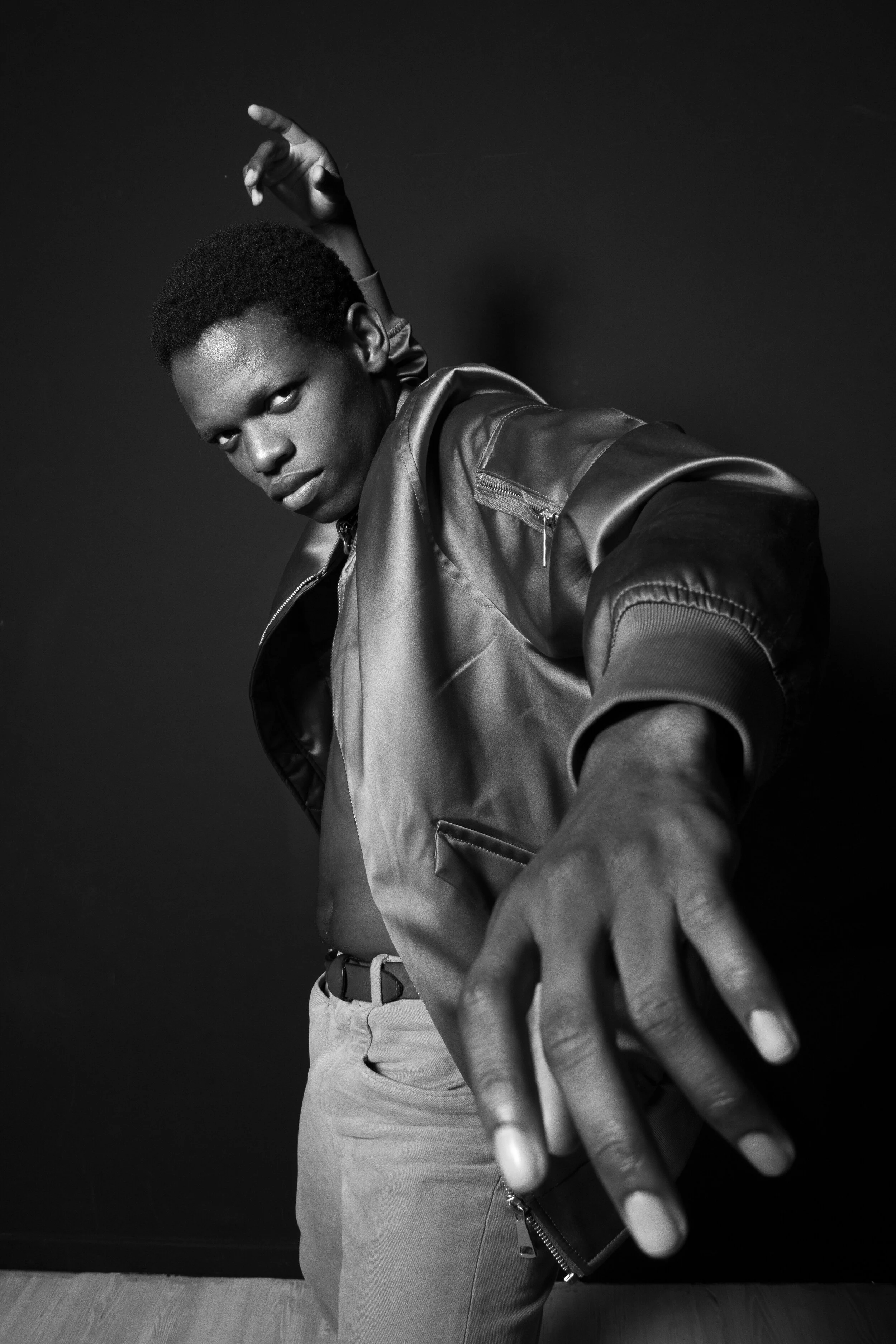 Photographer: Dario Tucci Wardrobe Credits: Trousers : Zara Orange jacket : H & M