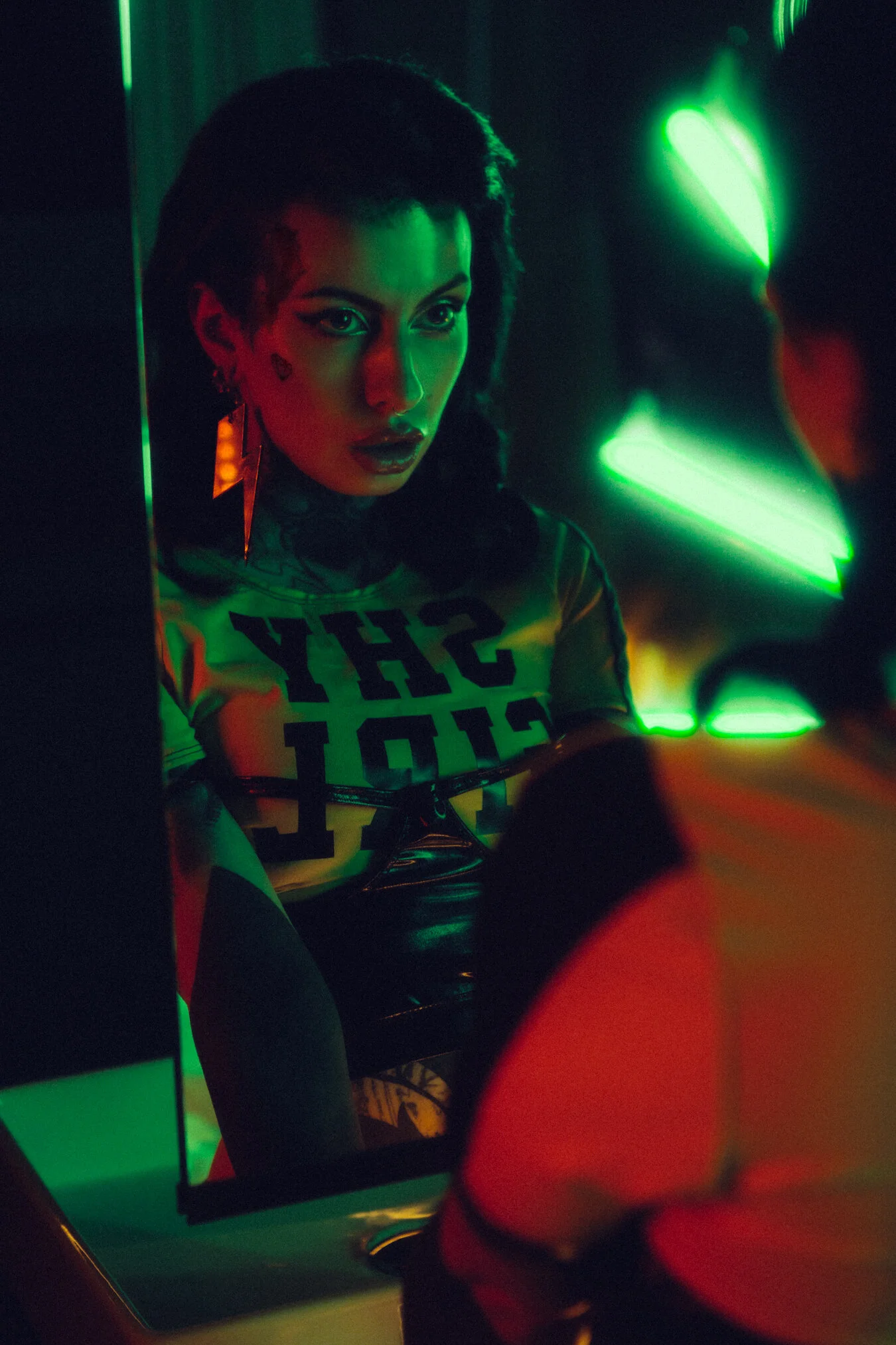 Photographer: Davide Aronnax Female Model: Dark Liquor Makeup Artist: Eva Herbohn Assistant: Nina Blck Fashion Designer: Ivy Berlin Wardrobe Credits: Earrings, T-Shirt and Bra: Ivy Berlin
