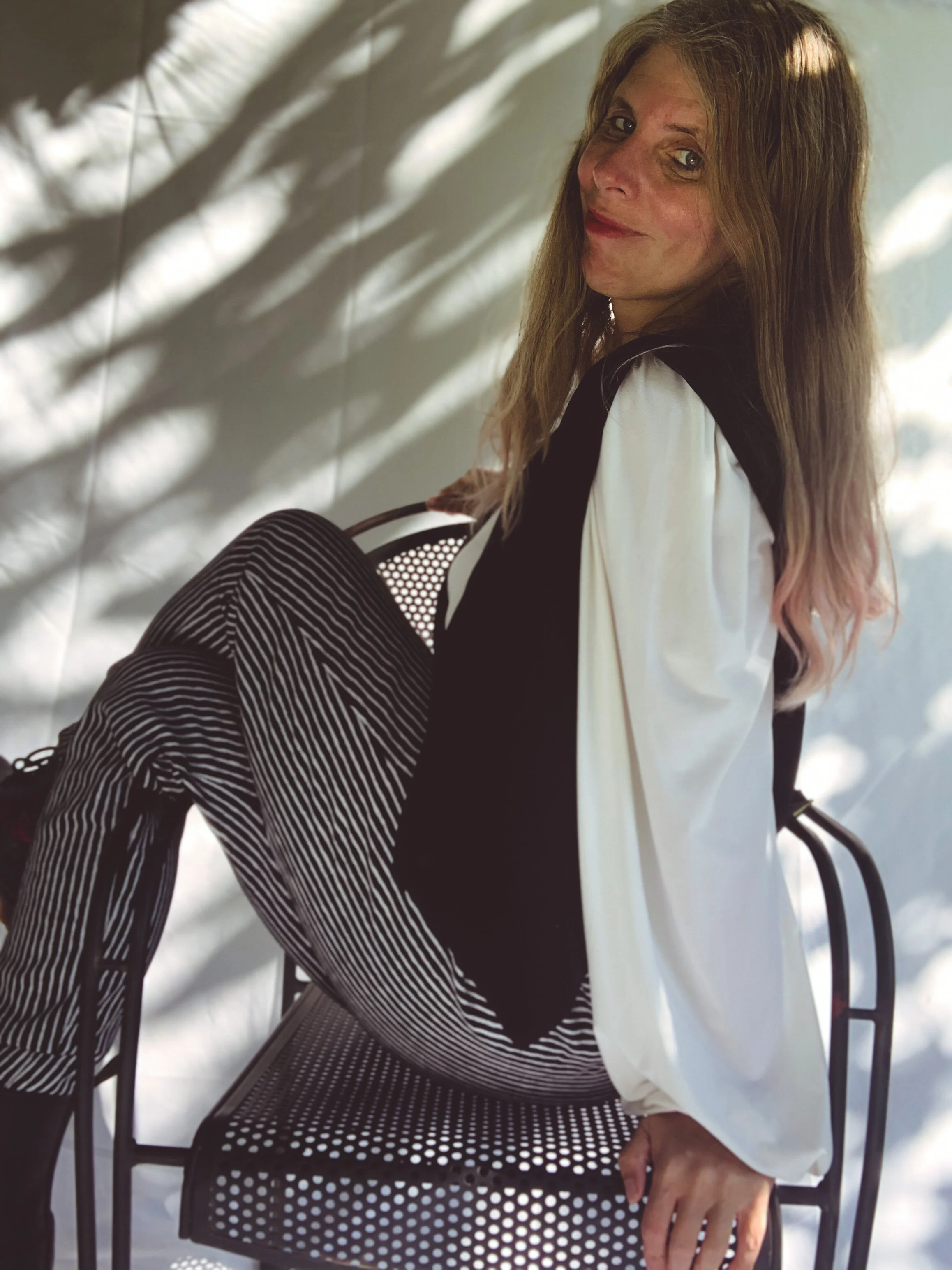 Female Model/Photographer/Creative Director: Kristian Comer Producer: James Comer Wardrobe Credits: Top: La Femme en Noir Vest: La Femme en Noir Pants: La Femme en Noir