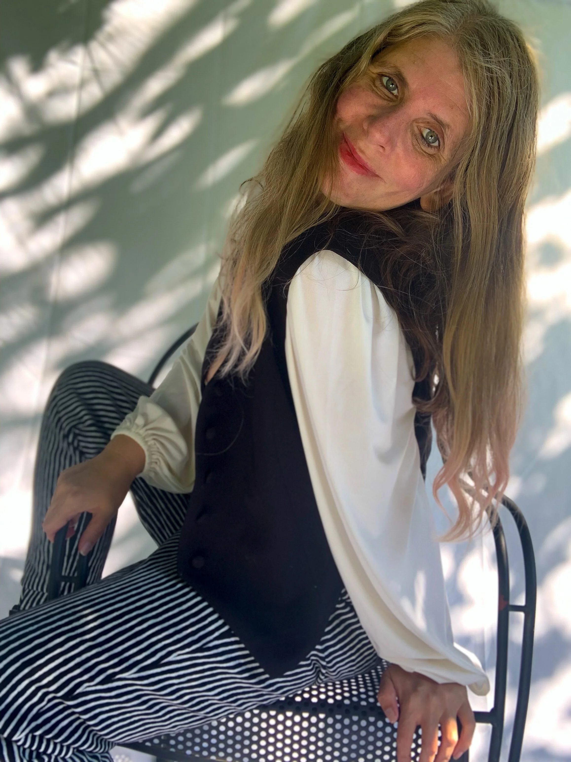 Female Model/Photographer/Creative Director: Kristian Comer Producer: James Comer Wardrobe Credits: Top: La Femme en Noir Vest: La Femme en Noir Pants: La Femme en Noir