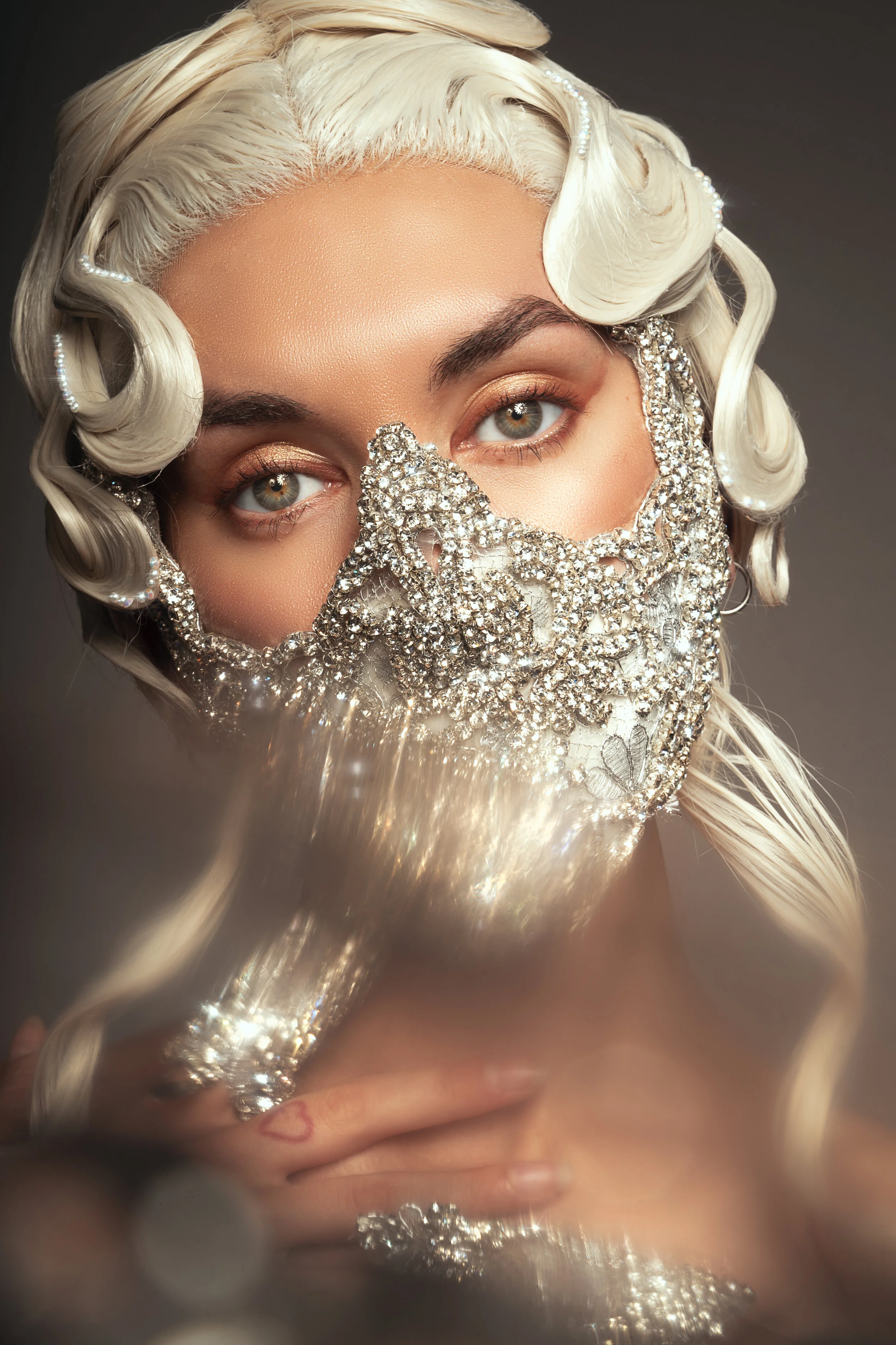 Photographer/Retoucher/Creative Director: Ayla Carli Female Model: Simone Piper Fashion stylist: UGLYSTYLIST Hair Stylist: Dan W Chapman Makeup Artist: Shantal Requeijo Wardrobe Credits: Embellished mask - Hollyann Tullett