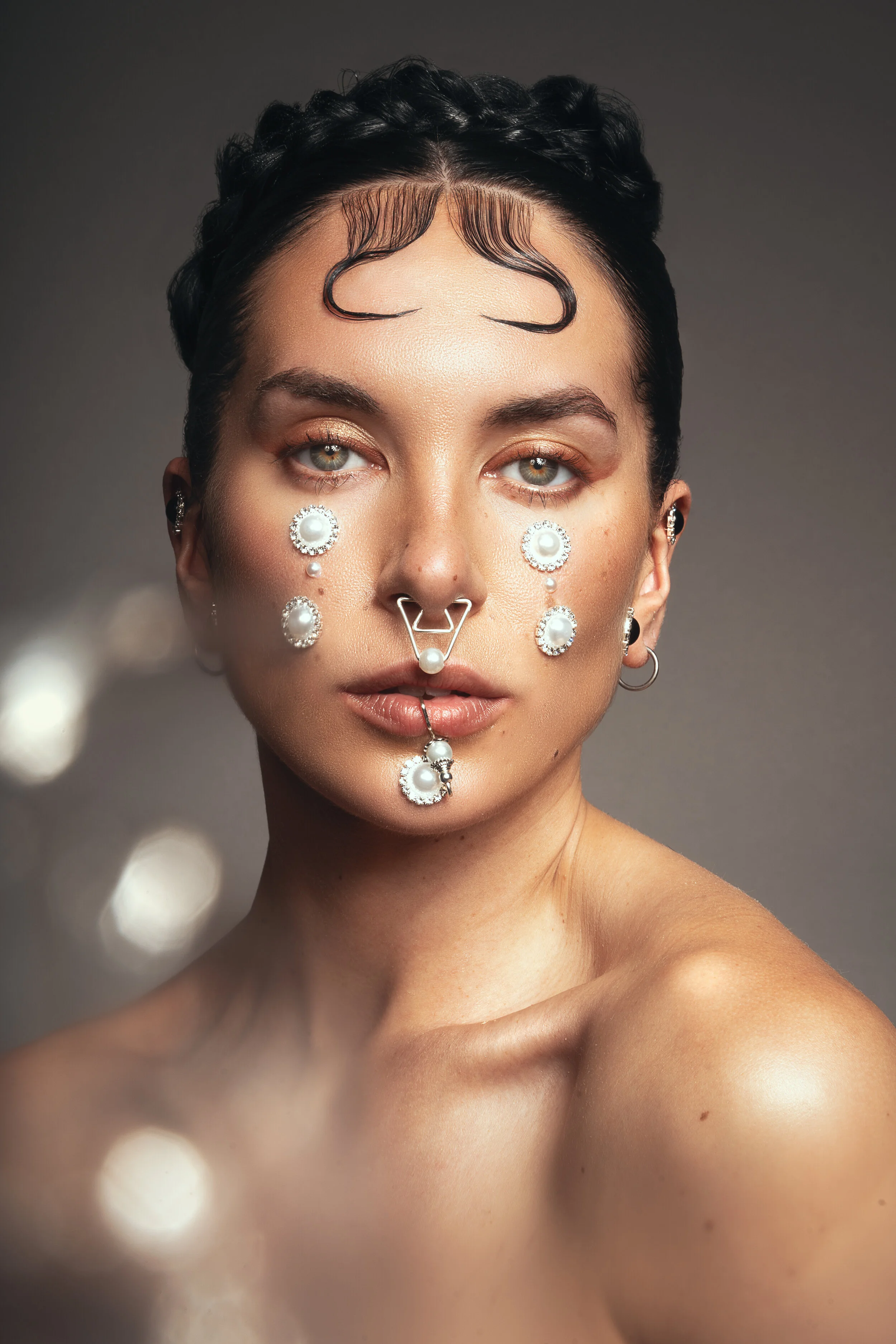 Photographer: Ayla Carli Female Model: Simone Piper Makeup Artist: Shantal Requeijo Hair Stylist: Dan W Chapman Fashion stylist: UGLYSTYLIST Wardrobe Credits: Pearled tria nosepiece & lip ring - Inaurem
