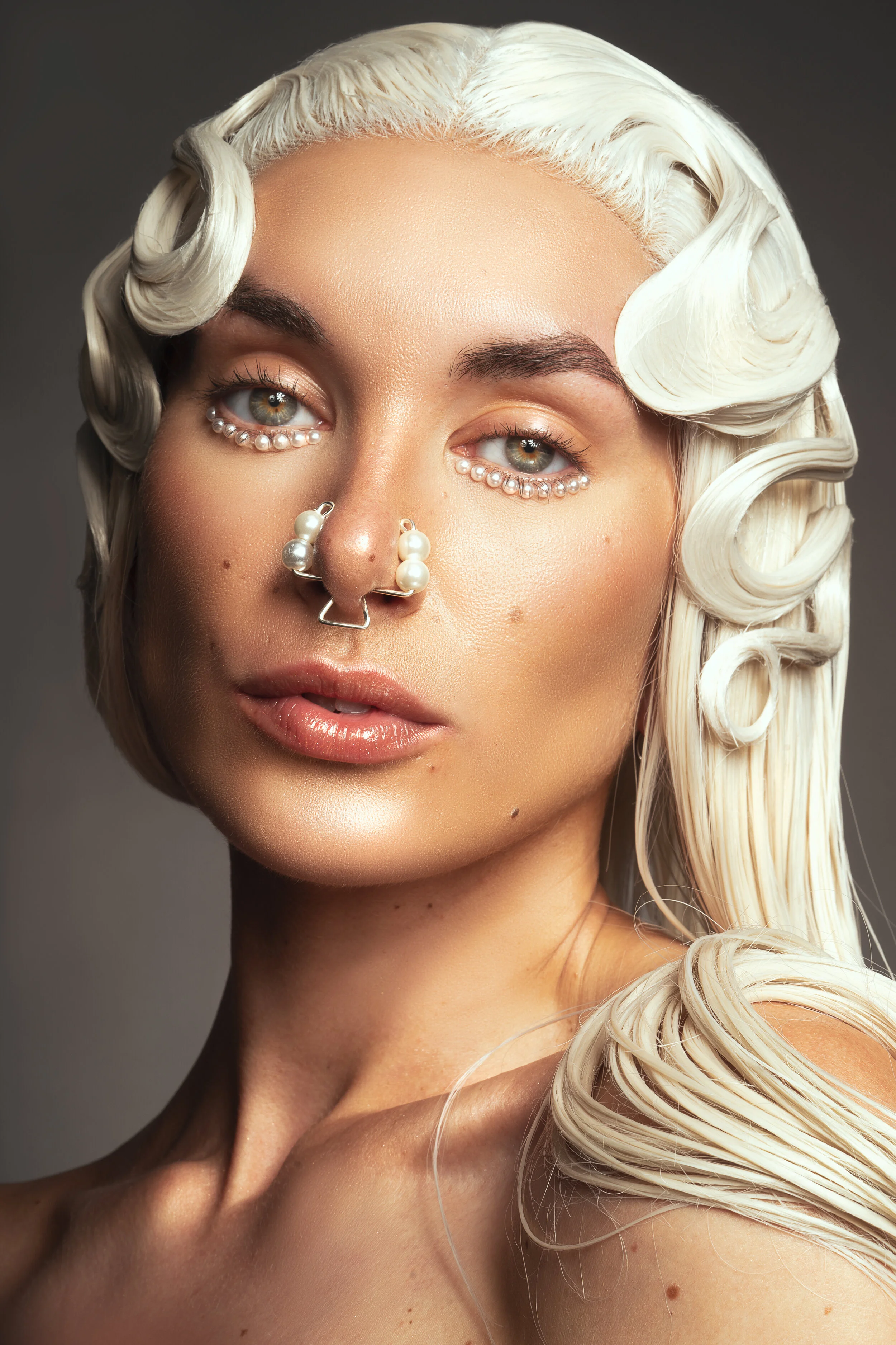 Photographer: Ayla Carli Female Model: Simone Piper Makeup Artist: Shantal Requeijo Hair Stylist: Dan W Chapman Fashion stylist: UGLYSTYLIST Wardrobe Credits: Pearled taurus nosepiece - Inaurem