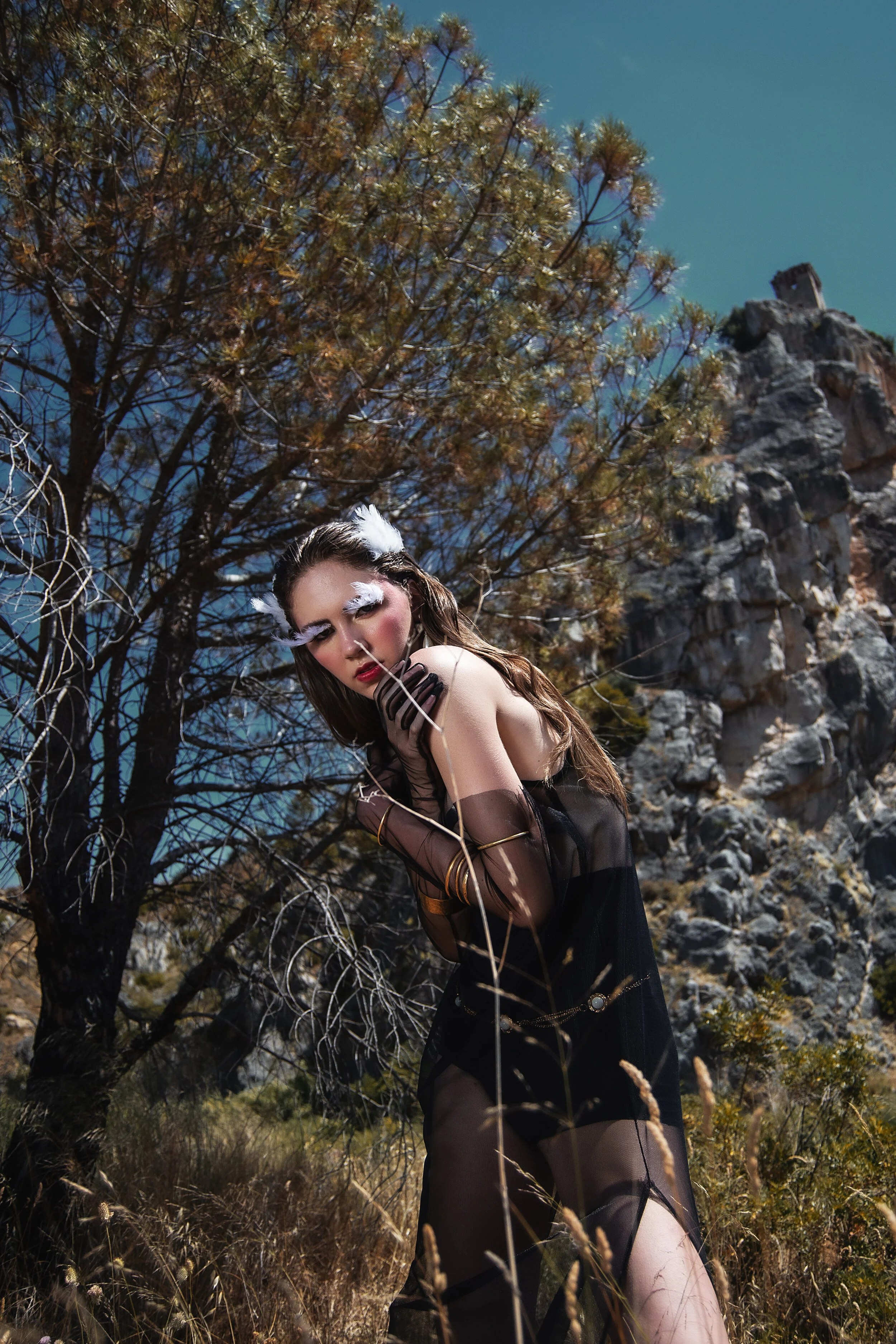 Photographer: Kamila Gjoka Model: Olivia Falciani @Espirit Model Management Makeup Artist: Enrica Belloni Stylist: Leonardo Pomposi Wardrobe Stylist: Elvira Savarese Wardrobe Credits: Black seethrough tunic: 16r Gloves: 16r Red fur: