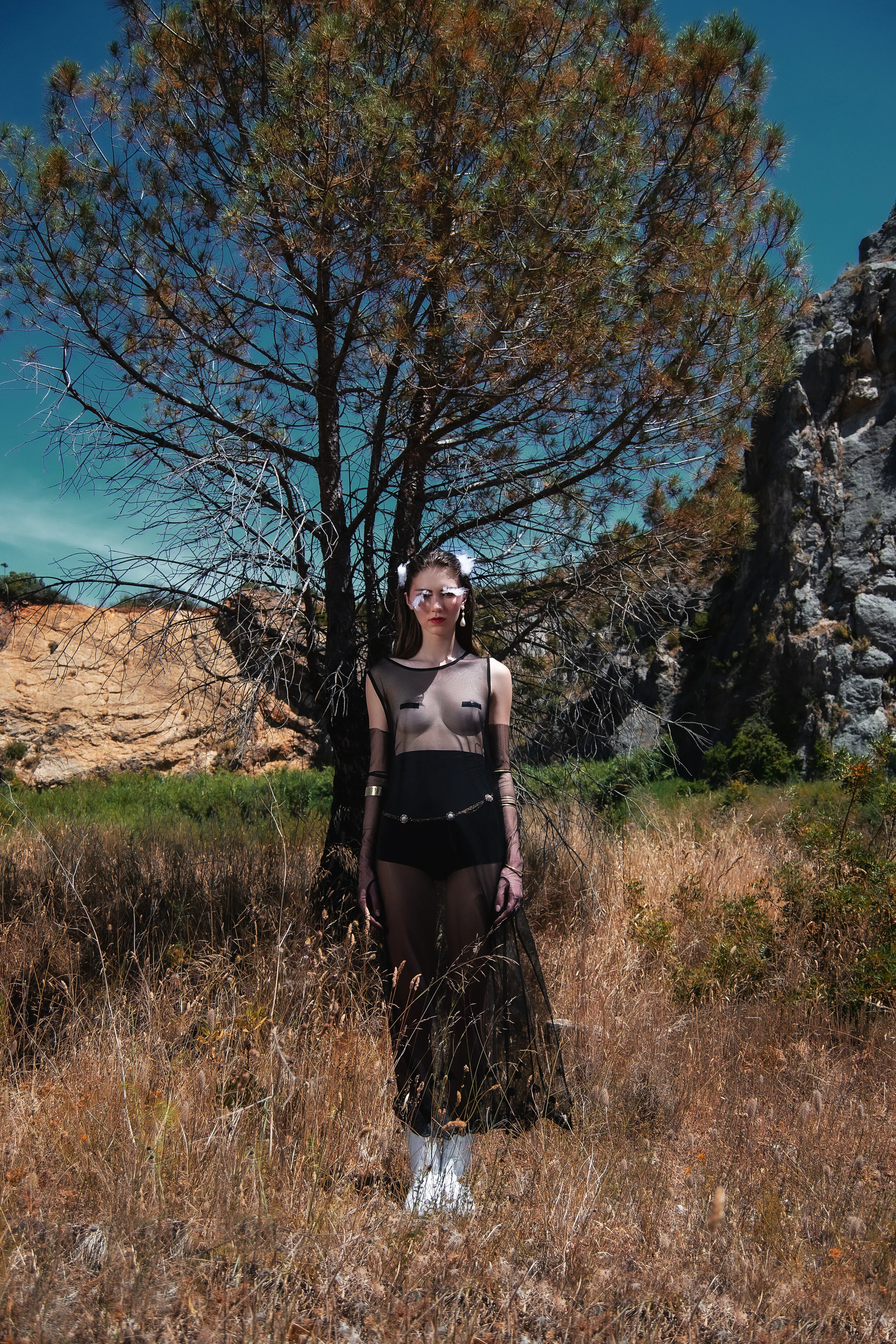 Photographer: Kamila Gjoka Model: Olivia Falciani @Espirit Model Management Wardrobe Stylist: Elvira Savarese Makeup Artist: Enrica Belloni Stylist: Leonardo Pomposi Wardrobe Credits: Clothes Credits 2nd Set Black seethrough tunic: 1