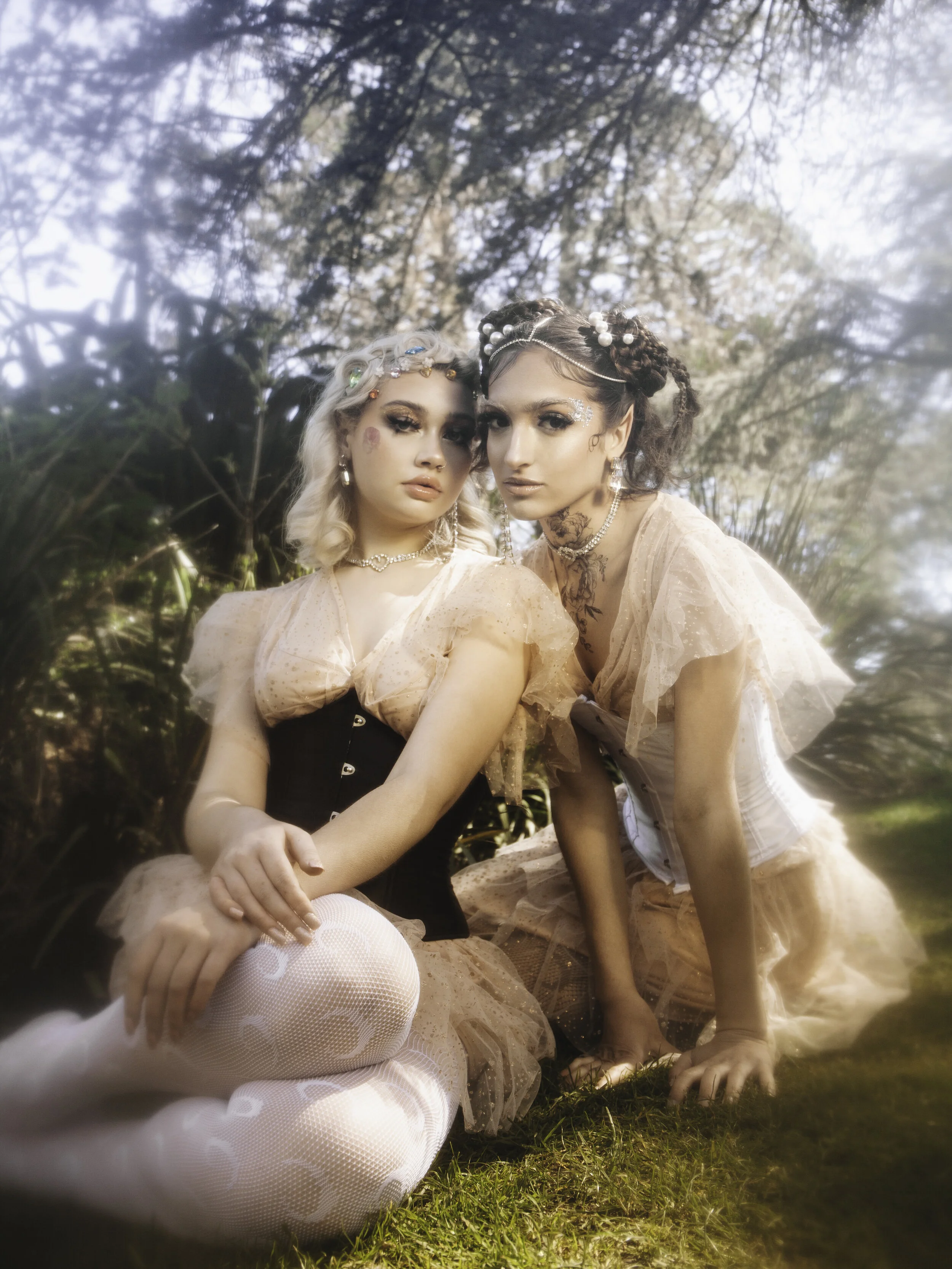 Photographer: Clara Barroso Model: Eleri Evans Female Model: Beatriz Saramago Makeup Artist: Zoe Philippa Efthymiadou Assistant: Georgia Sears Wardrobe Credits: Pink Dress-ASOS Choker Necklace-ASOS Earrings-ASOS White and Black Corset-