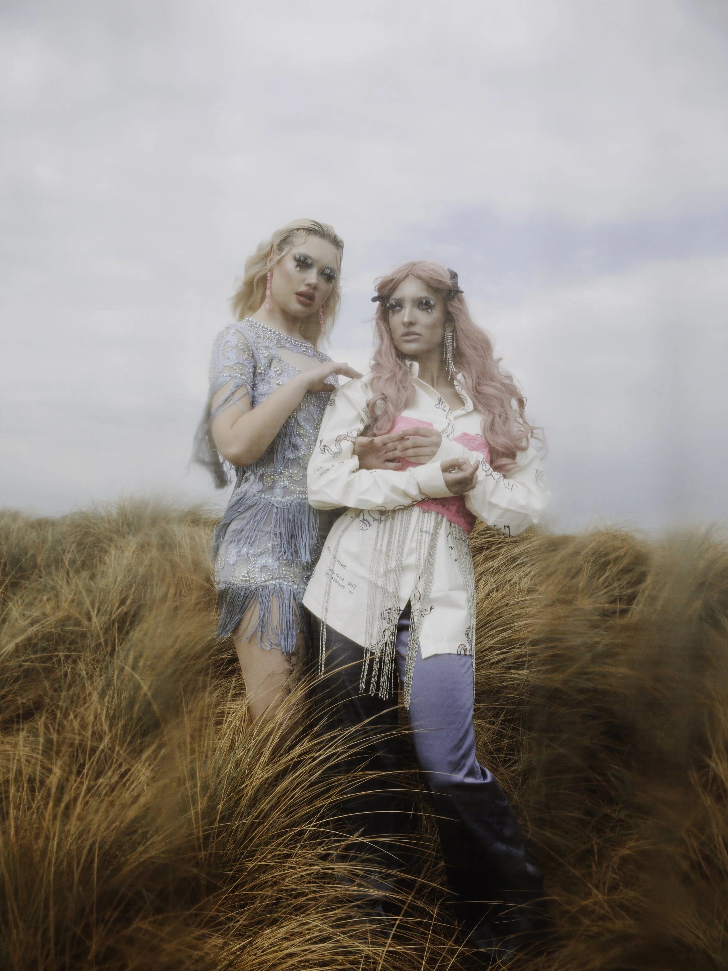 Photographer: Clara Barroso Model: Eleri Evans Female Model: Beatriz Saramago Makeup Artist: Zoe Philippa Efthymiadou Assistant: Georgia Sears Wardrobe Credits: Blue Dress-ASOS White Printed Shirt-ASOS Neon Pink Corset Top-ASOS Blue Sa