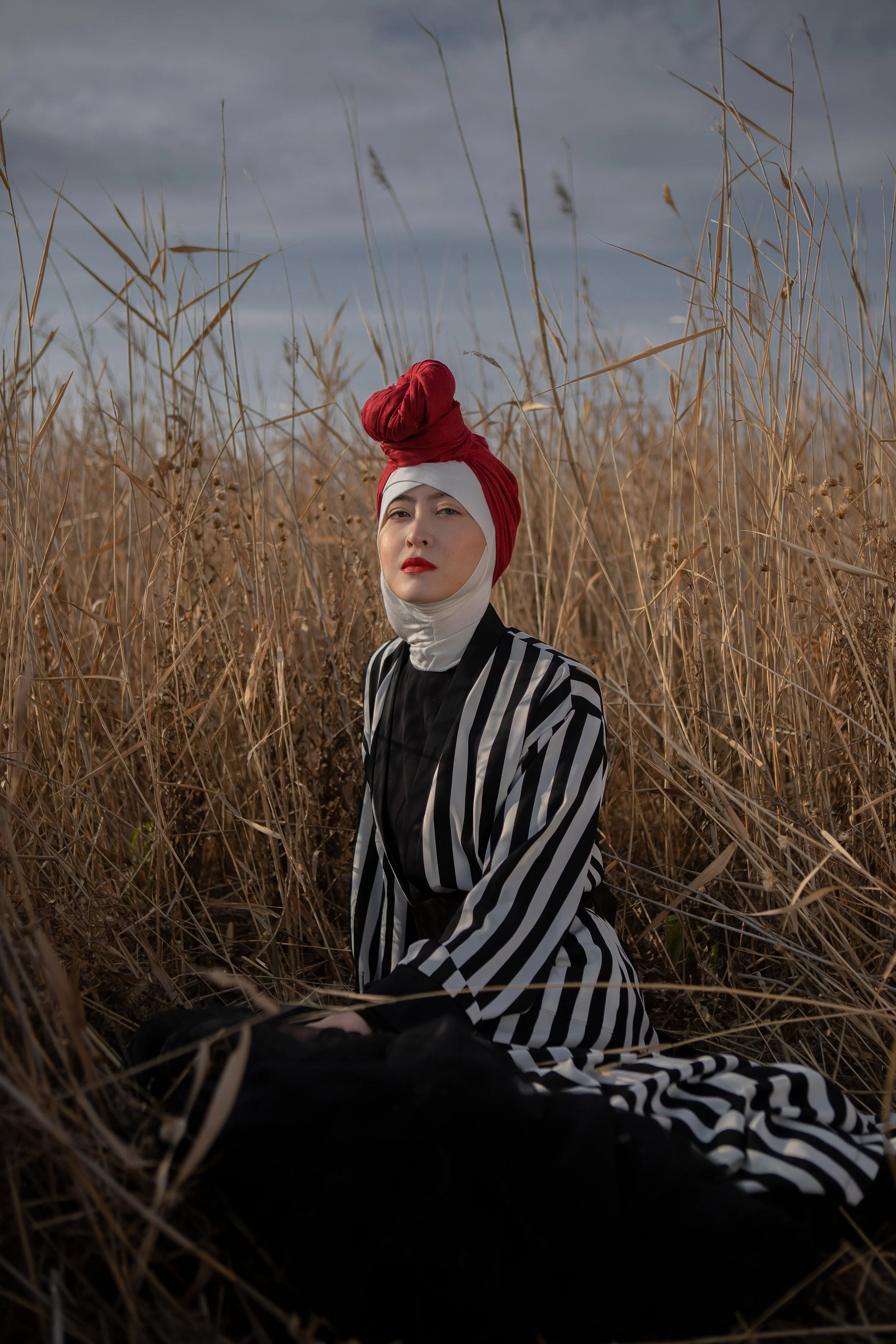 Photographer/Retoucher: Aigul Yesseyeva Model/Makeup Artist: Ainura Kabyldina Assistant: Anar Sattar Wardrobe Stylist: Anara Kairbayeva Wardrobe Credits: Headscarf Louis Vuitton Dress Isabel Garcia Robe Vintage Al-Almira Safiya