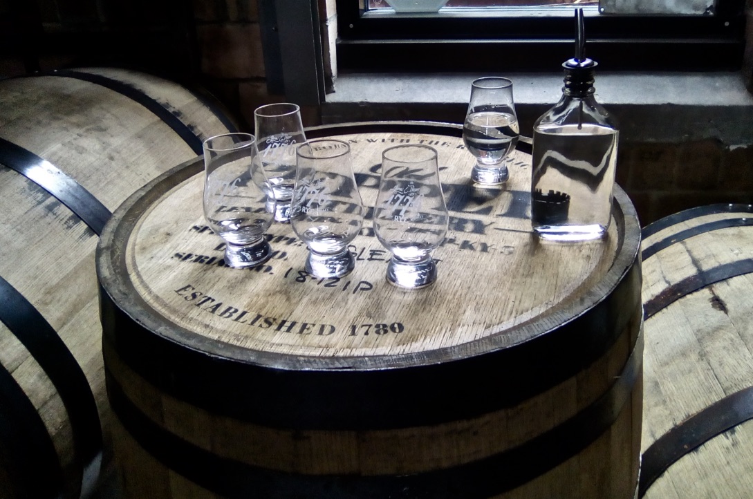 “Wine” or “White Dog” tasting stop with sourvenir JP sipping glasses. Photo Credit: Mike Mayer, August 2018