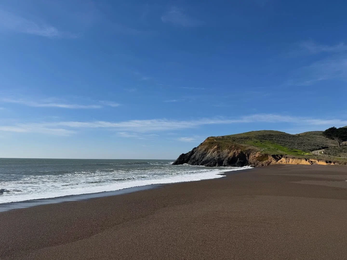 Lovely day today at Rodeo Beach/Rodeo Lagoon/Hawk Hill. Have always loved the unique dark color of the sand at the beach there.