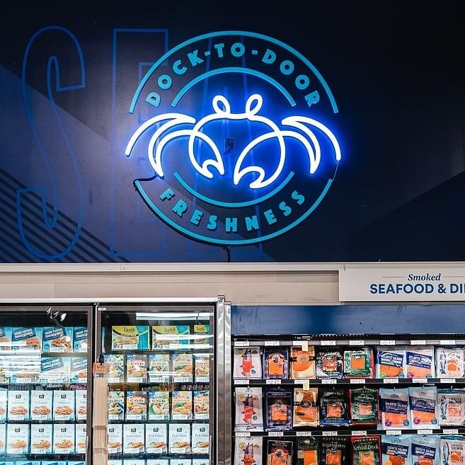 Gotta love a good neon sign! Here's a whimsical seafood icon we designed all lit up for @wholefoods Fort Lauderdale.