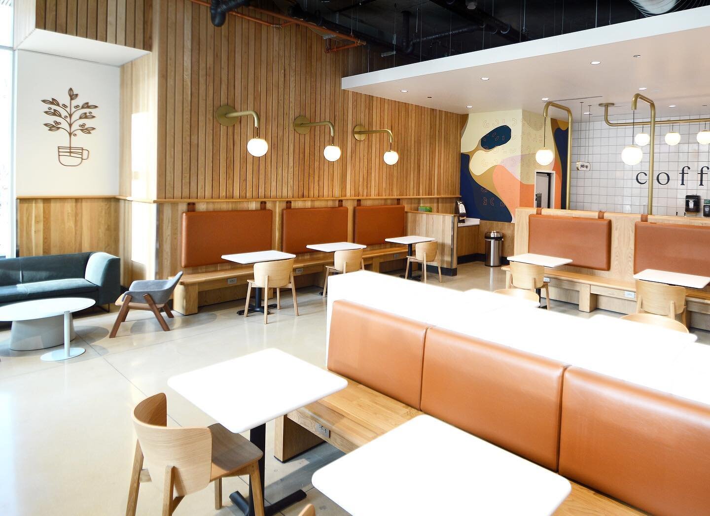 @wholefoods recently opened their coffee shop located on the first level of Chicago&rsquo;s Gold Coast location. Blend provided design services for custom seating, millwork &amp; lighting. Our finishes along with signage and decor helped form a cohes