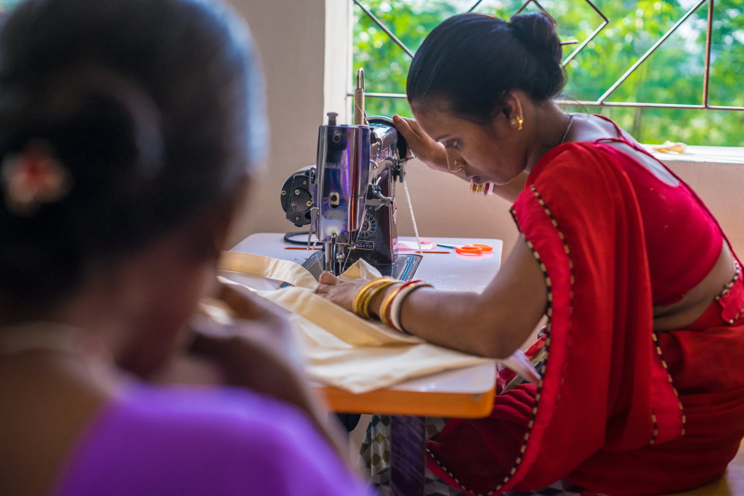 Employee-Rakhi-working-on-tote-bag.jpg