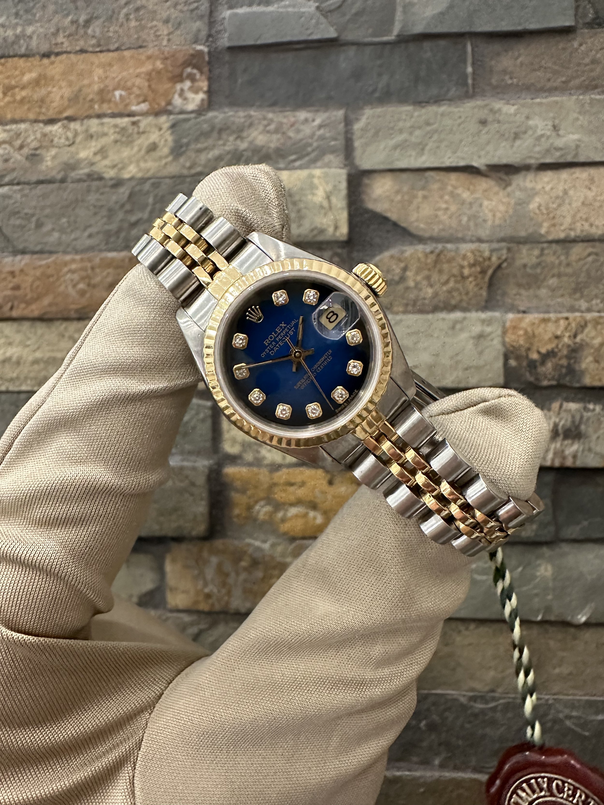 1985 Blue Vignette Rolex DJ26 REF #69173 with box. Call or stop by our shop