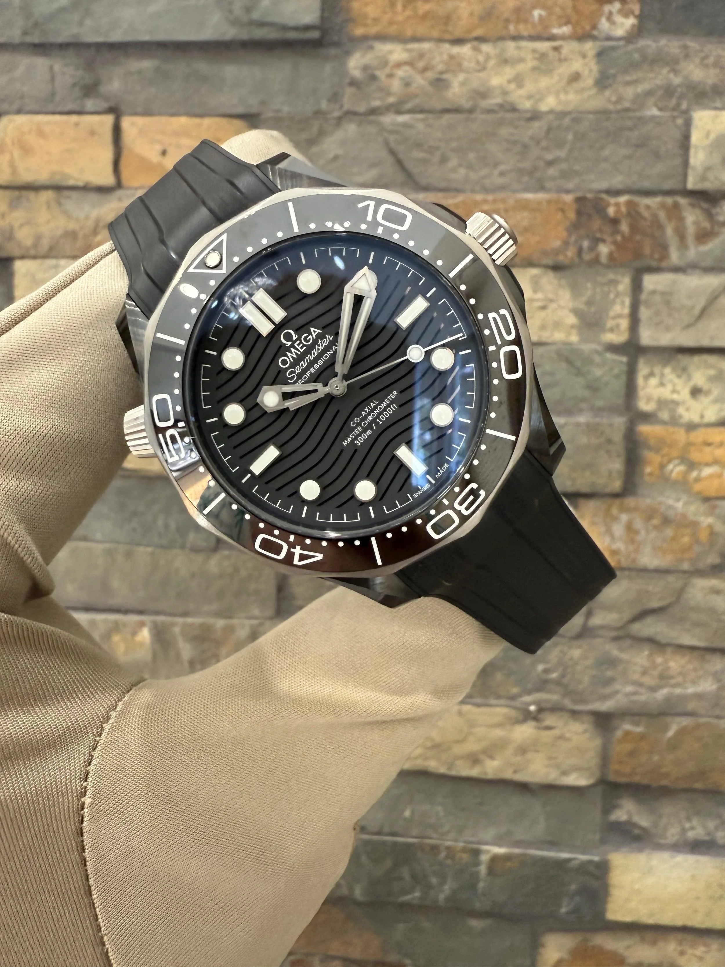 2025 Omega Black Ceramic SMP300 REF #210.92 with box and papers. Call or stop by our shop
