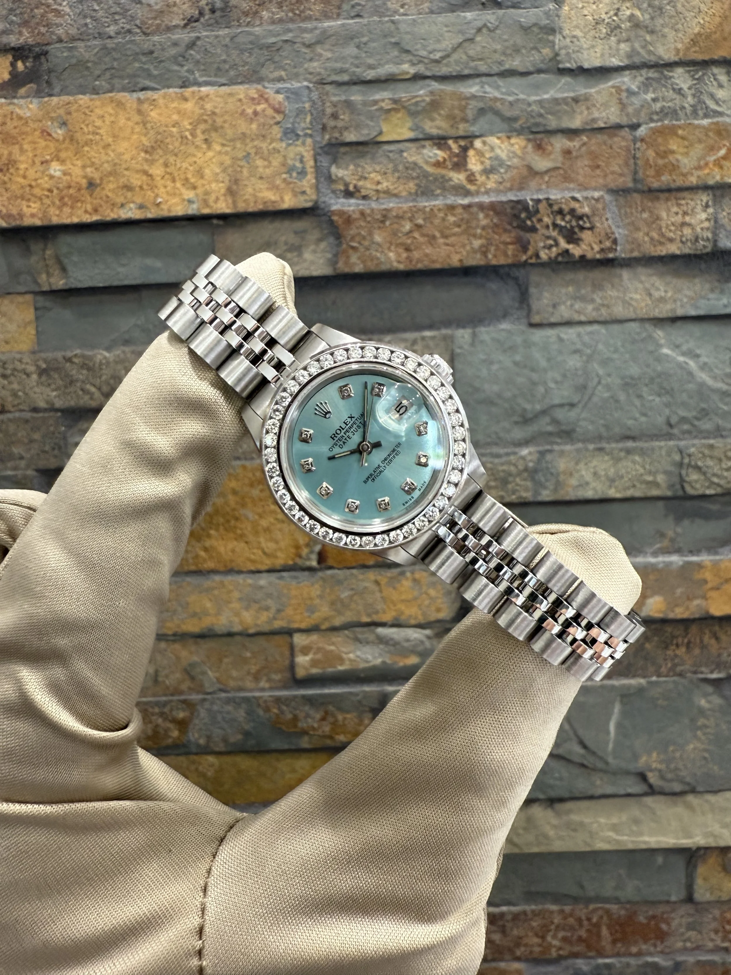1988 Custom Ice Blue Rolex DJ26 REF #79240 with box and papers. Call or stop by our shop