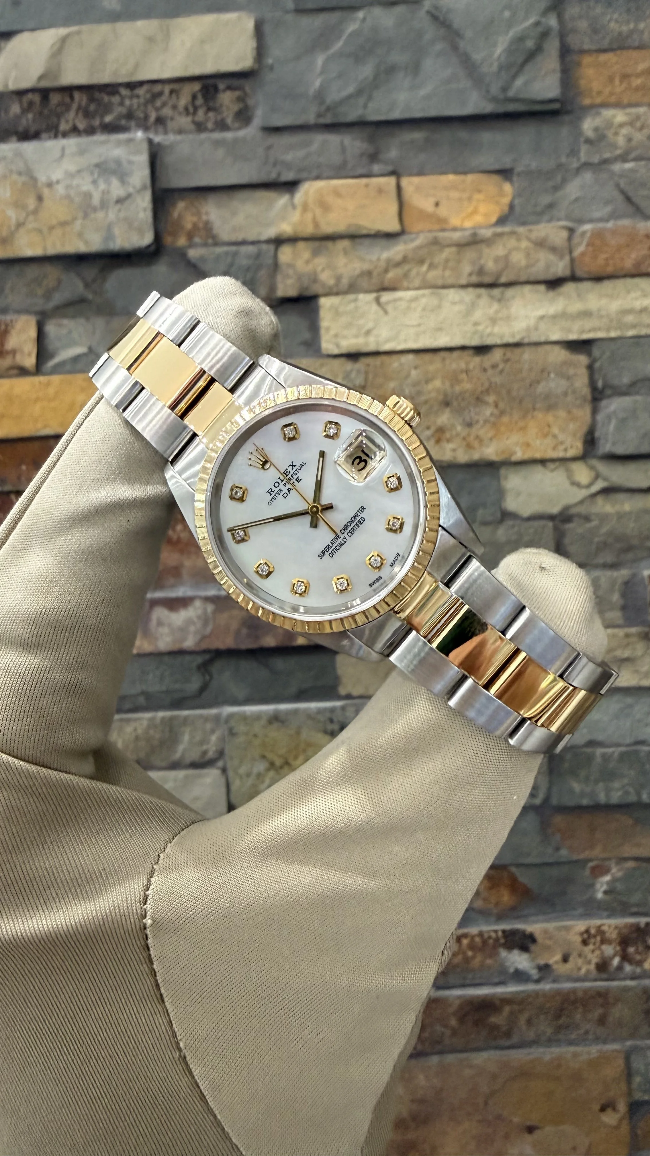 1996 Custom MOP Rolex Date 34mm REF #15223 with a box. Call or stop by our shop