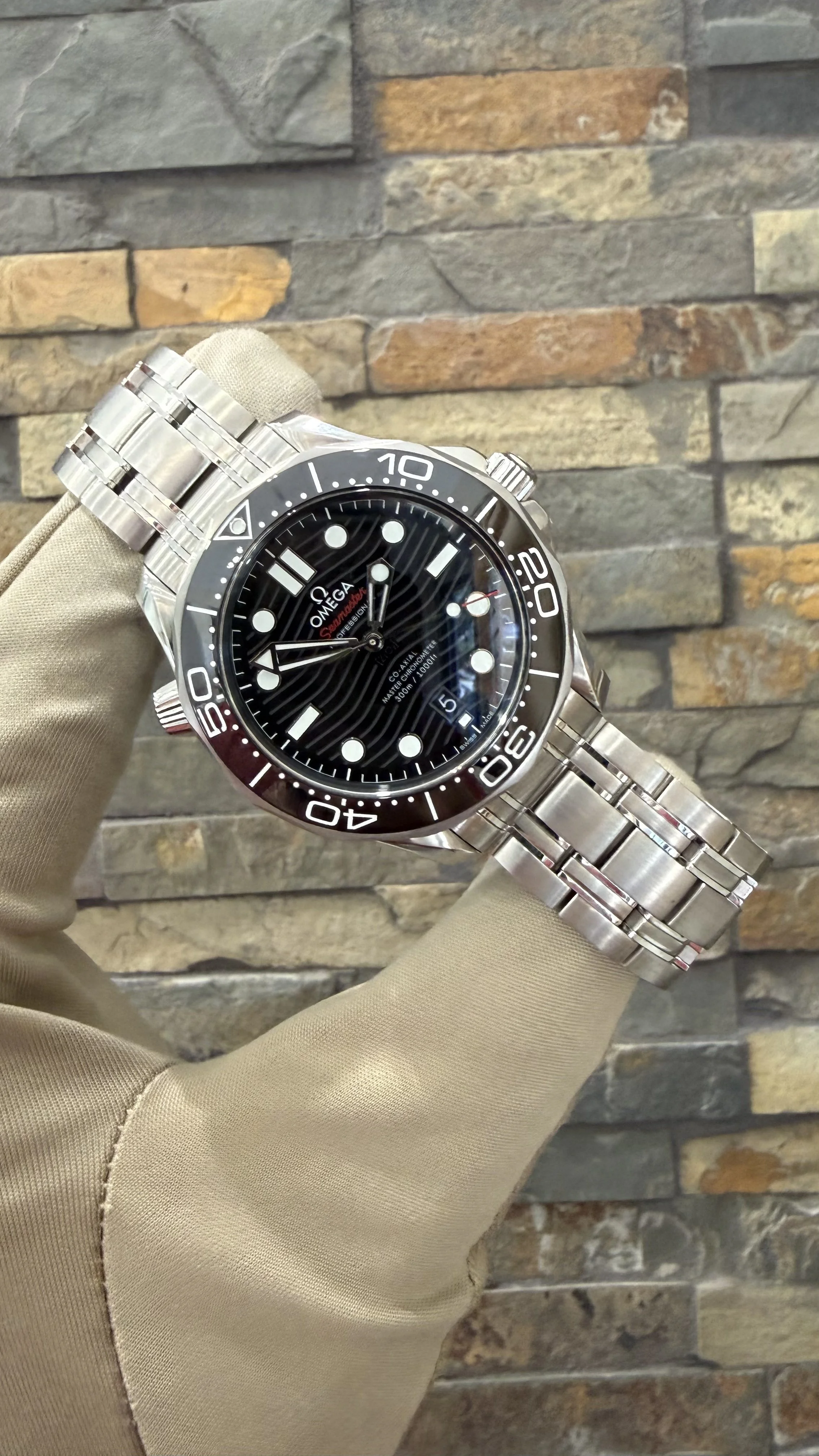 2022 Omega Black SMP300 REF# 210.30.42.20.01.001 with box and papers. Call or stop by our shop