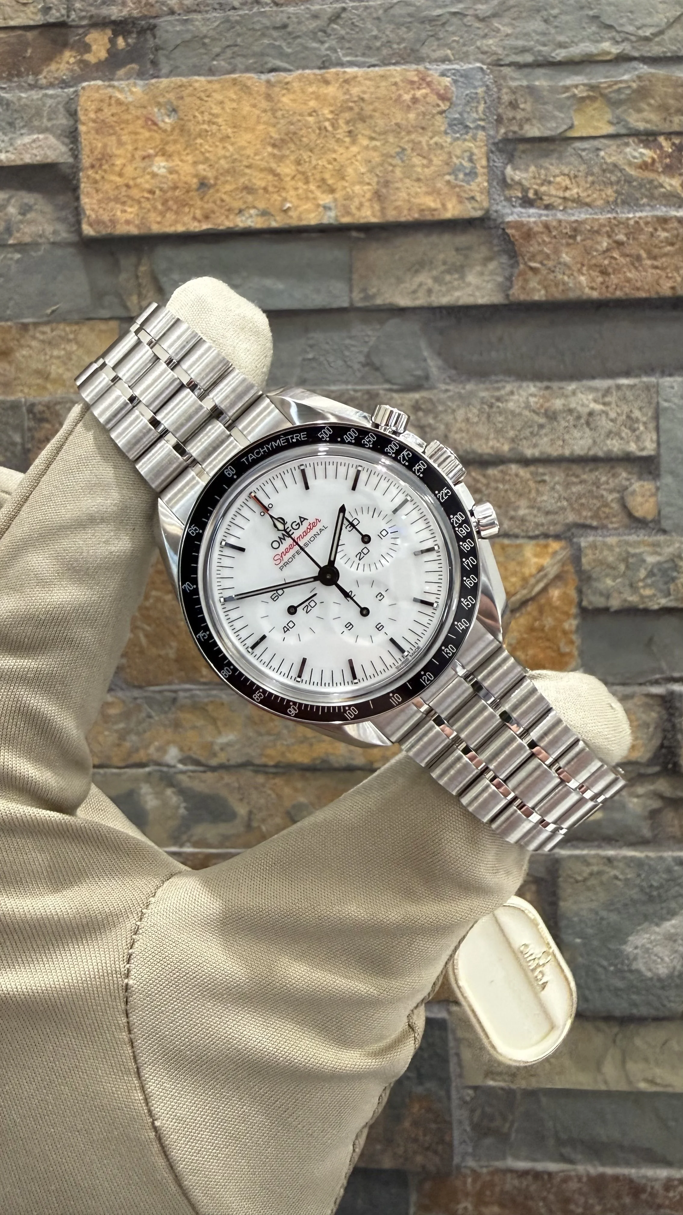 2026 White Omega Speedmaster 42mm REF # 310.30.42.50.04.001 with box and papers. Call or stop by our shop