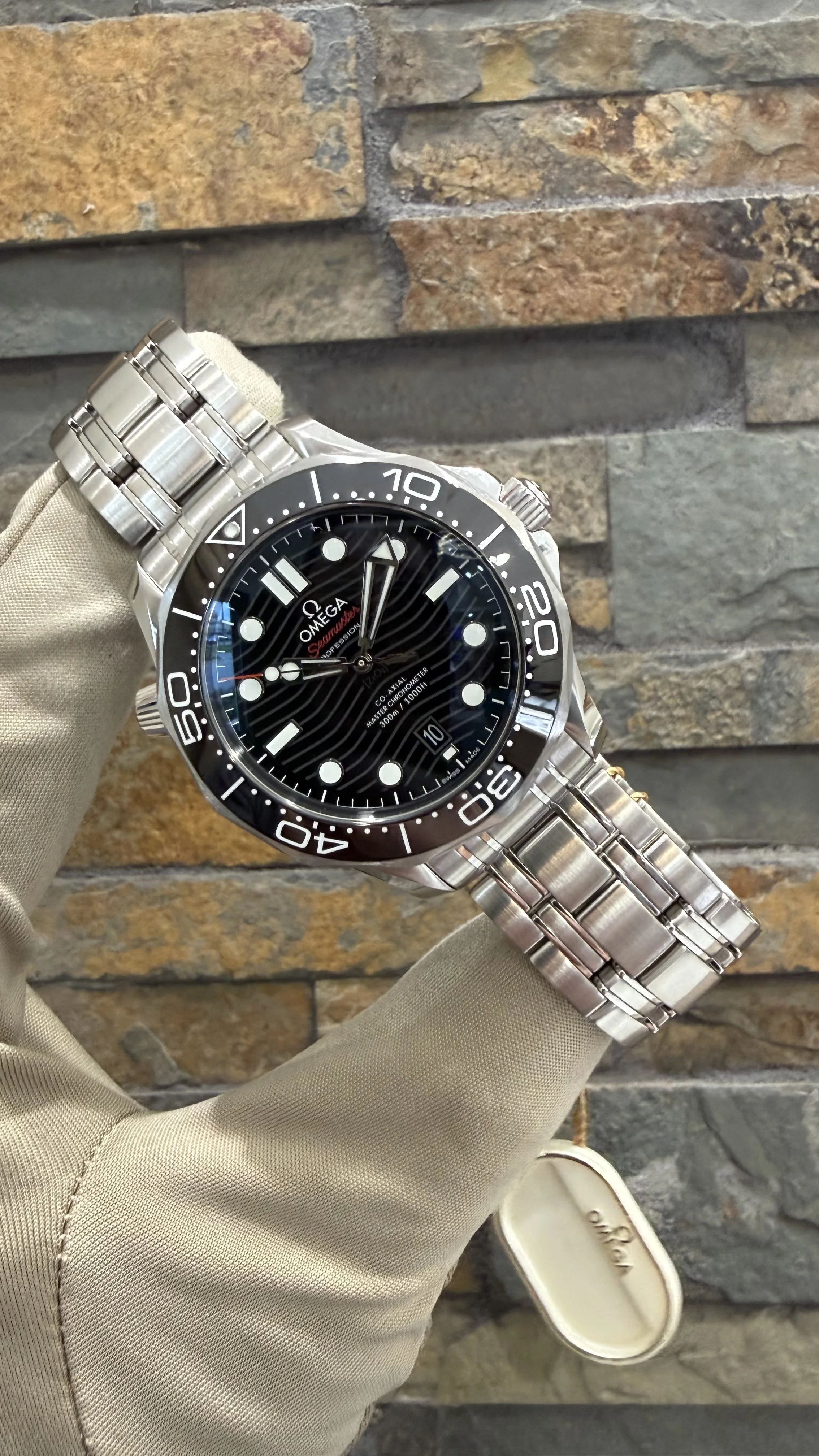 2026 Black Omega SMP300 REF #210.30.42.20.01.001 with box and papers. Call or stop by our shop