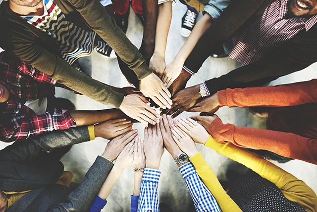 stock-photo-group-of-diverse-hands-together-joining-concept-344201303.jpg