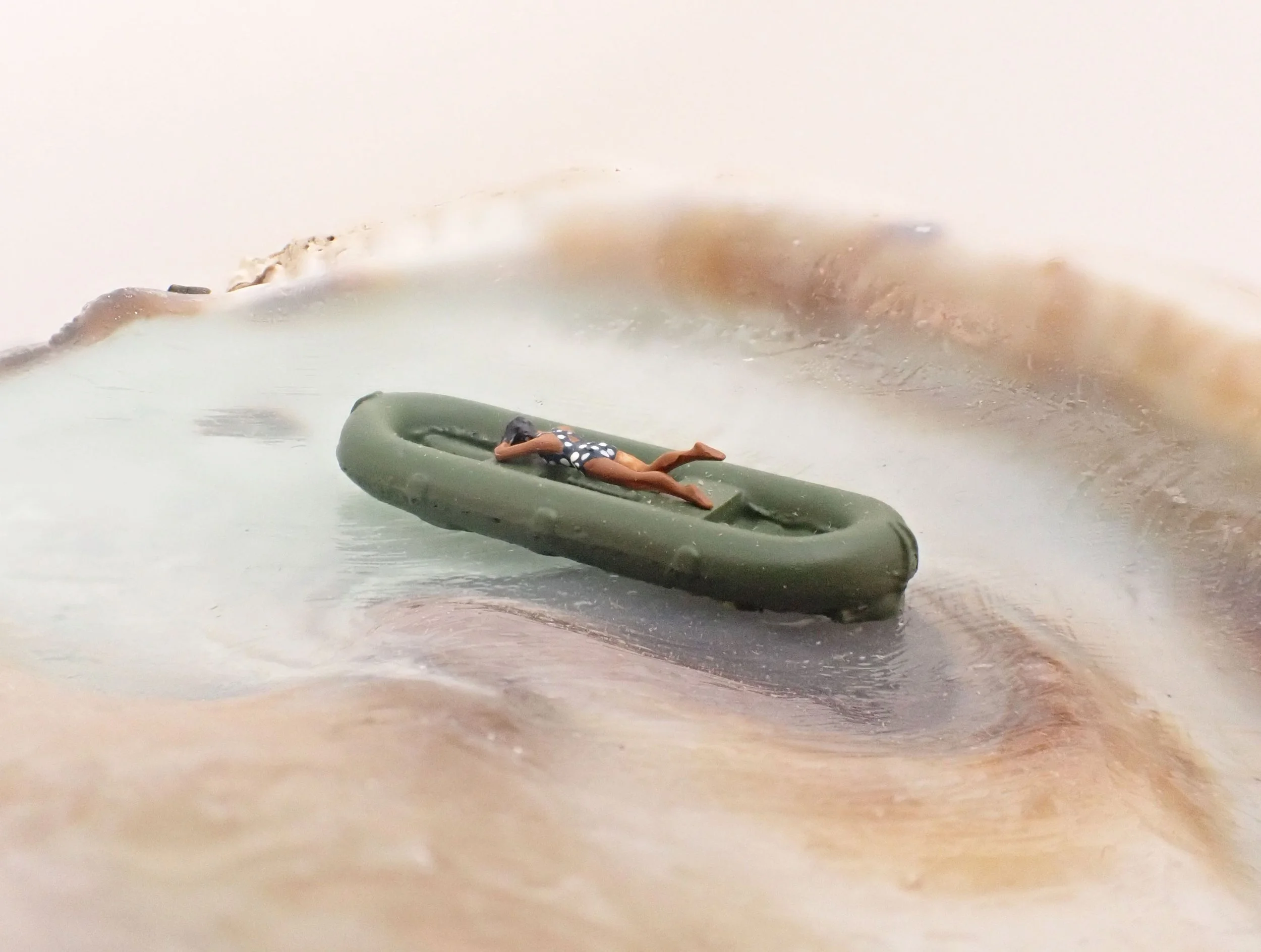 Becky-Wareing-Steele_Seashell-Diorama_Woman-Laying-on-a-Green-Raft_6_web.jpg