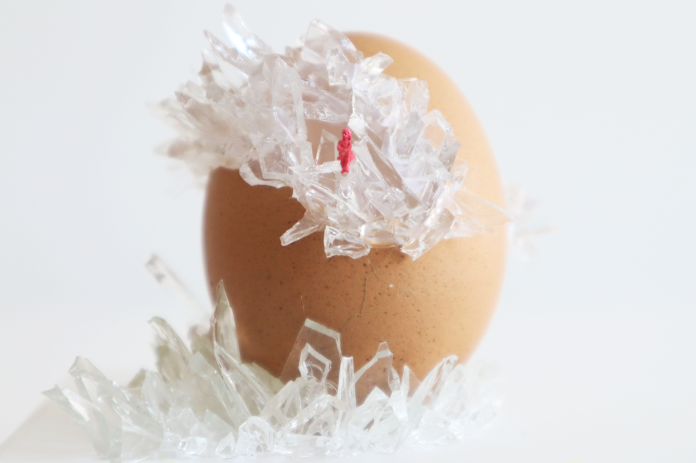 Untitled egg with broken glass.png