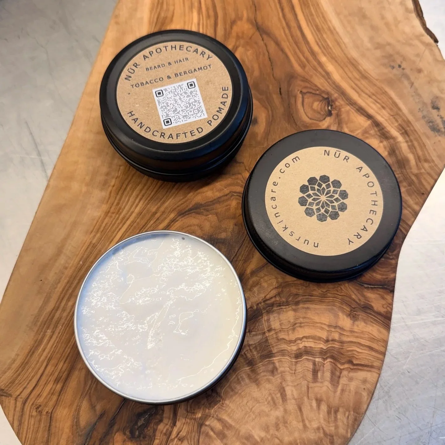 SILK ROAD COLLECTION 
Tobacco &amp; Bergamot Beard &amp; Hair Pomade

Enriched with shea butter and argan oil, this beard and hair pomade conditions the hair while giving it a soft hold. The scent is woodsy, masculine, with hints of tobacco and berga