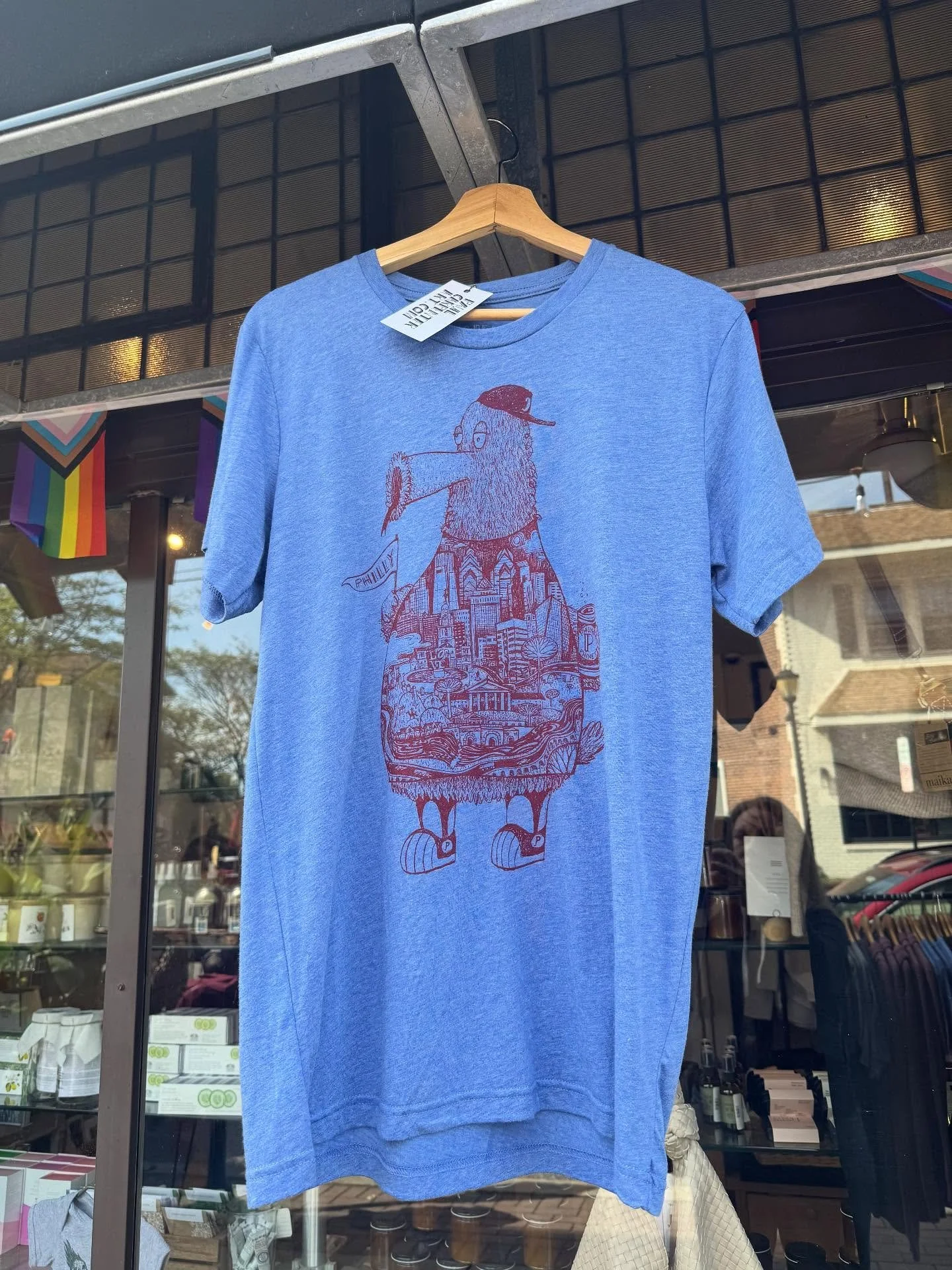 Where are my Philly Phans at?! @harveyoak is ready to cheer on the Phightin&rsquo; Phils! @paulcarpenterart Schwarber #12 tees are hot off the press and ready for you on our rack! #shoplocal #gophils⚾️