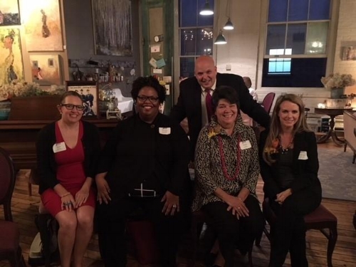 Brittany, far right, pictured with panel participants (from L to R): Kate Farrar, Tekisha Everette, and Estela Lopez. Back: Mark Berardi