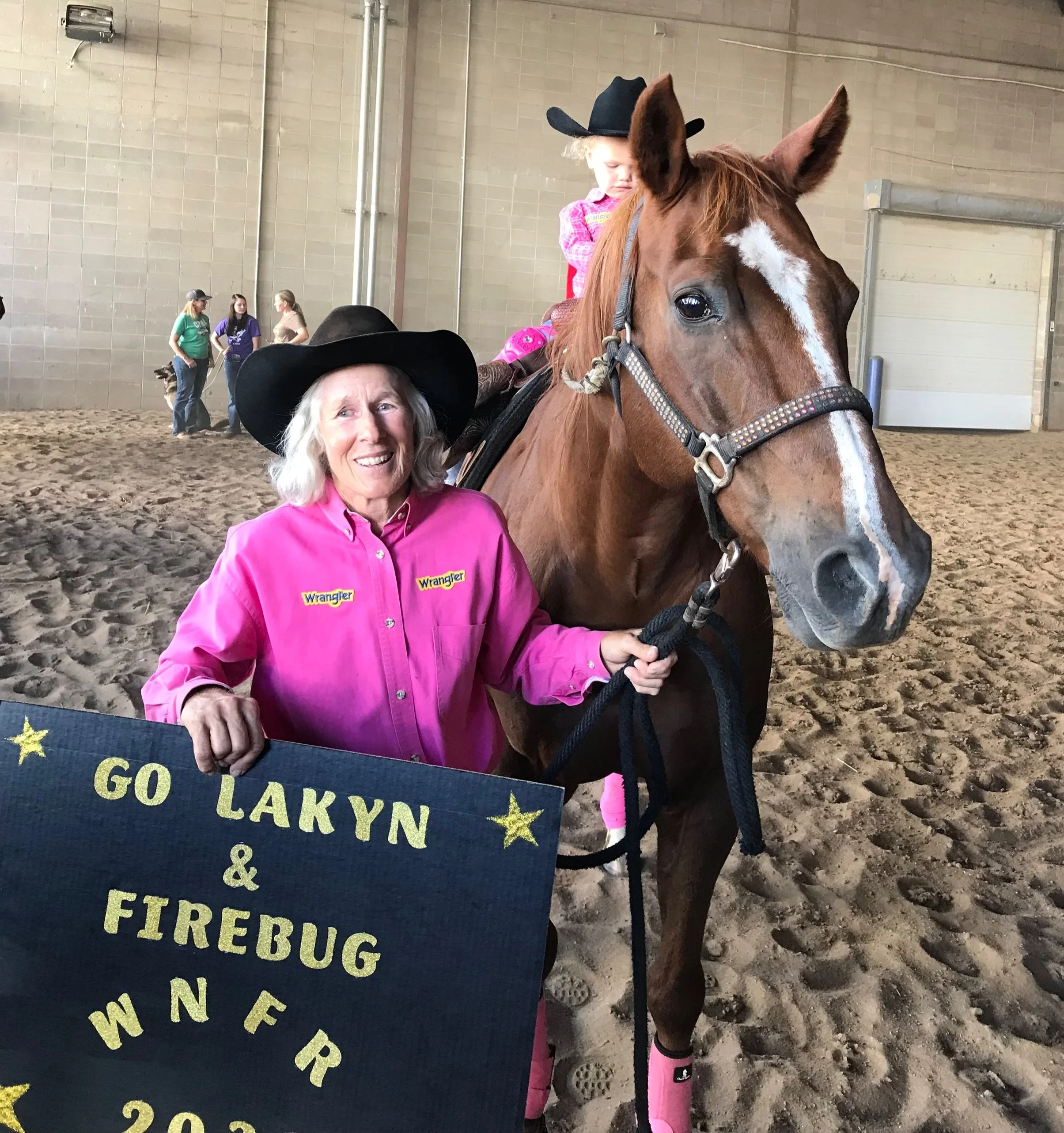 NFR Barrel Racer Jeanne Anderson in a barrel racing costume contest with her niece, Lakyn.