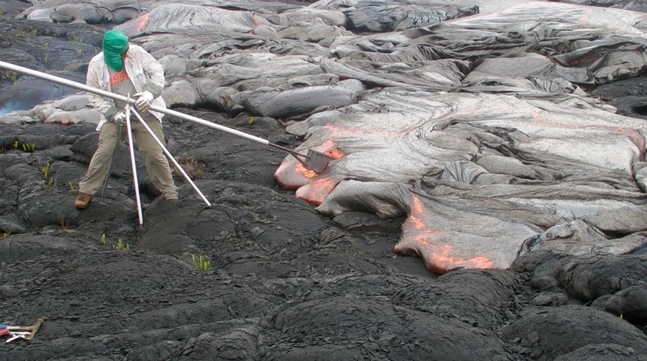 Gerry assisting Danny with casting lava on Kilauea Volcano, Hawaii, 2012.