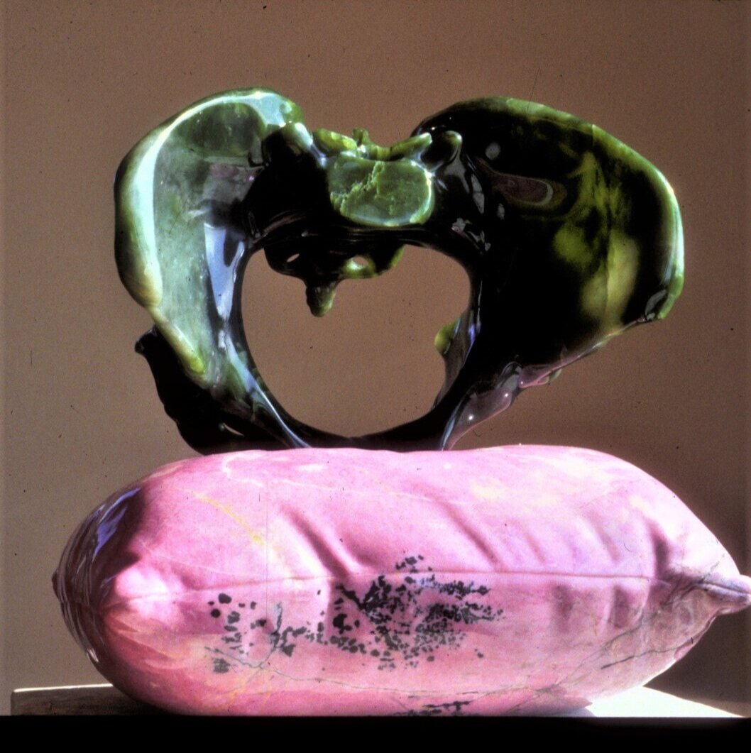    Rock-a-bye-Baby,  jade on rhodonite. 2001. Trinity Medical Research Institute  
