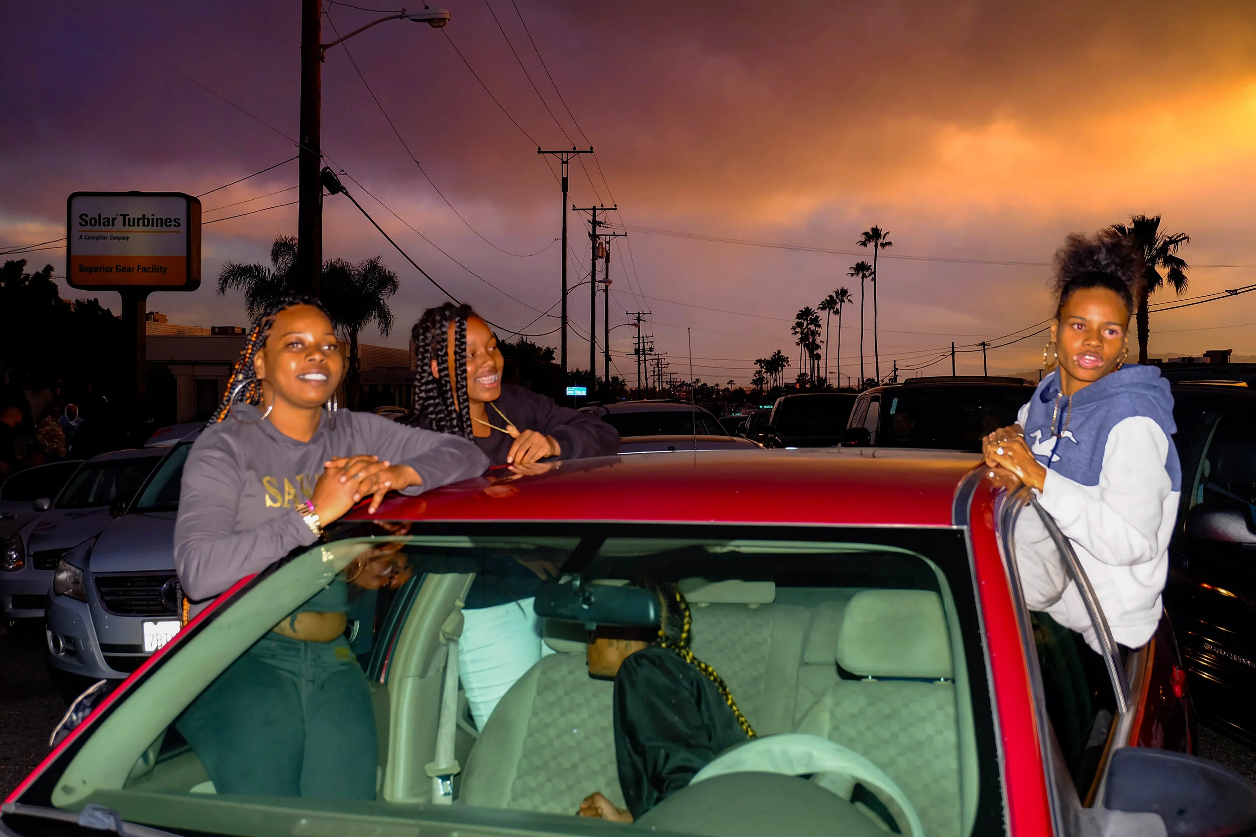 3 girls in Red Car.jpg