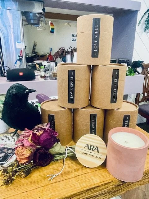 Ara love spell candles pyramid with pink one.jpg