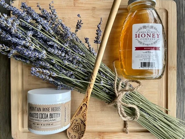 lavender honey lip balm ingredients flat lay.jpg