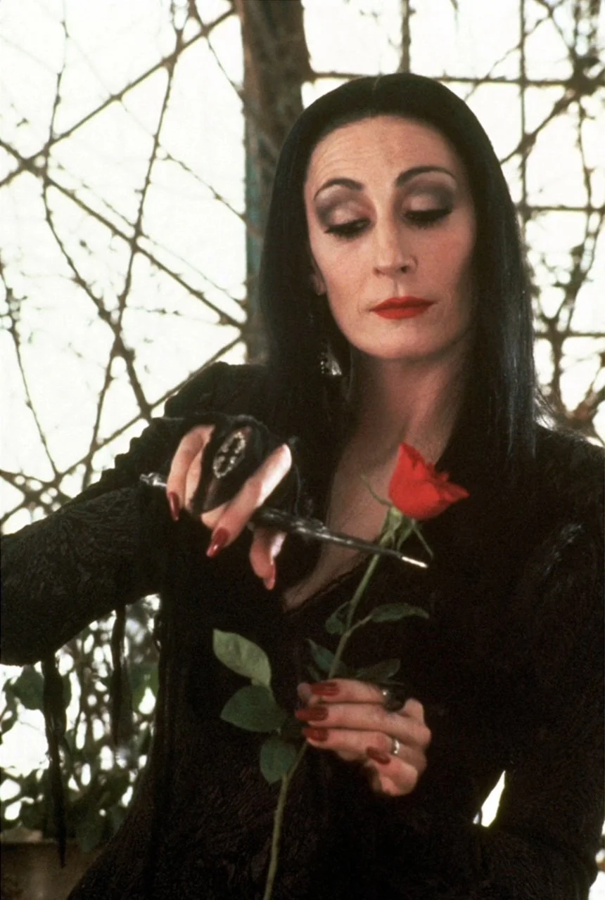 Morticia with rose.jpg