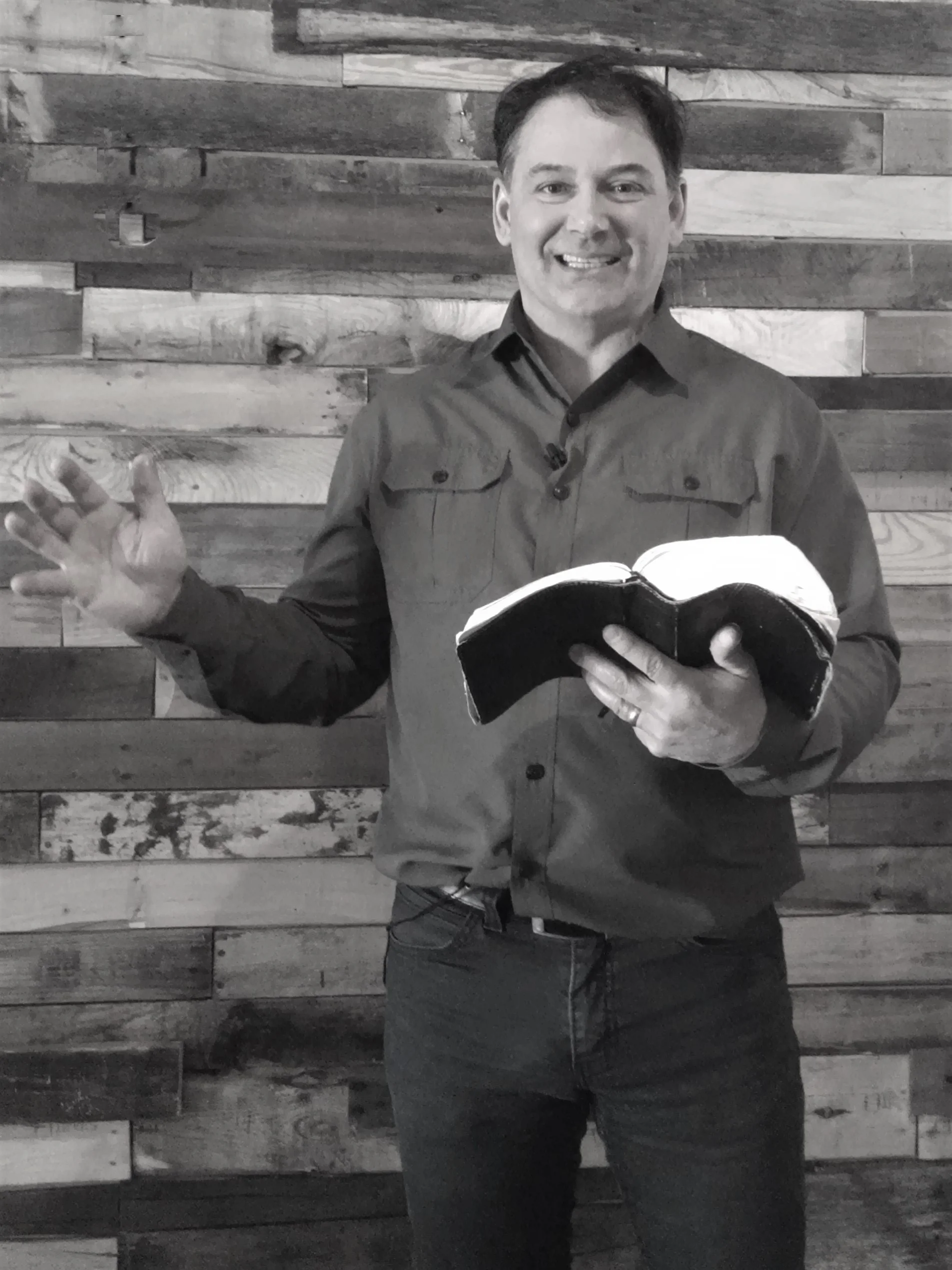 Doug with bible bw.jpg