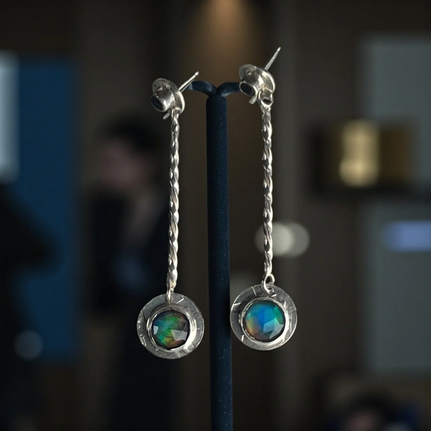 Aurora opal doublets and blue sapphires