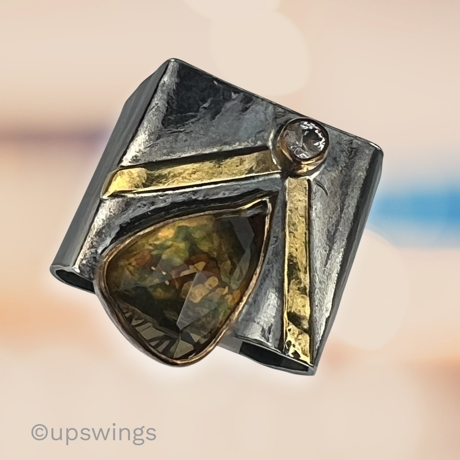 Upswings-Cute-square-ring-black-gold-plus.png