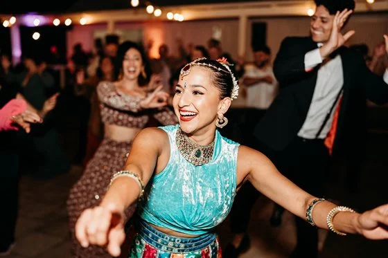 Simmone of Sirens Dance helps the guests at Sam and Hamish’s wedding to kick-off the dancing for the evening. Image courtesy of Margan Photography.