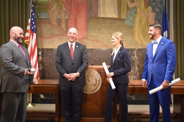 Left to right: Paul ”Brenden” Wagner, Governor John Bell Edwards, Casey Crawford and Cameron Plaisance.