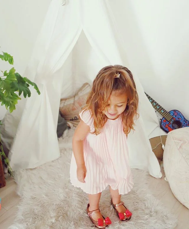 Your hair
long and thick and wild
reminds me of my own

A mane that i spent so long
trying to tame
with burnt heat 
in the clasps in an iron

i wish for you to always accept
those locks not easily combed
or broken or flattened or dulled
as you do rig