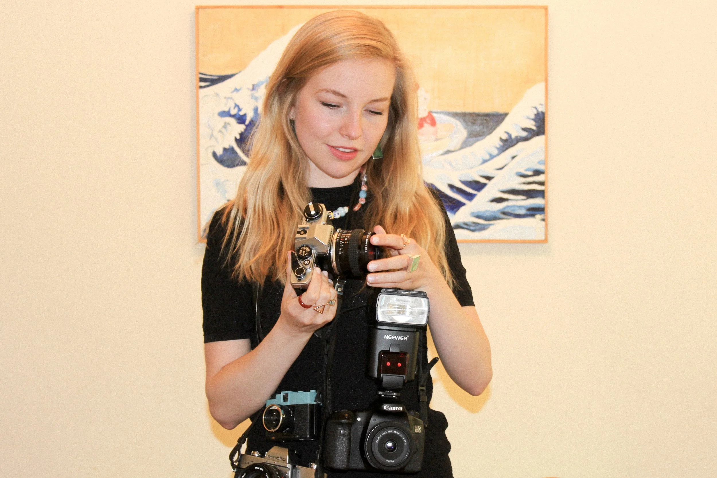 As far as my photo gear, I shoot with a Canon 5D Mark III and mostly my Olympus OM-10 for film. I really enjoy working in medium format, too. My favorite lens is the 24mm.