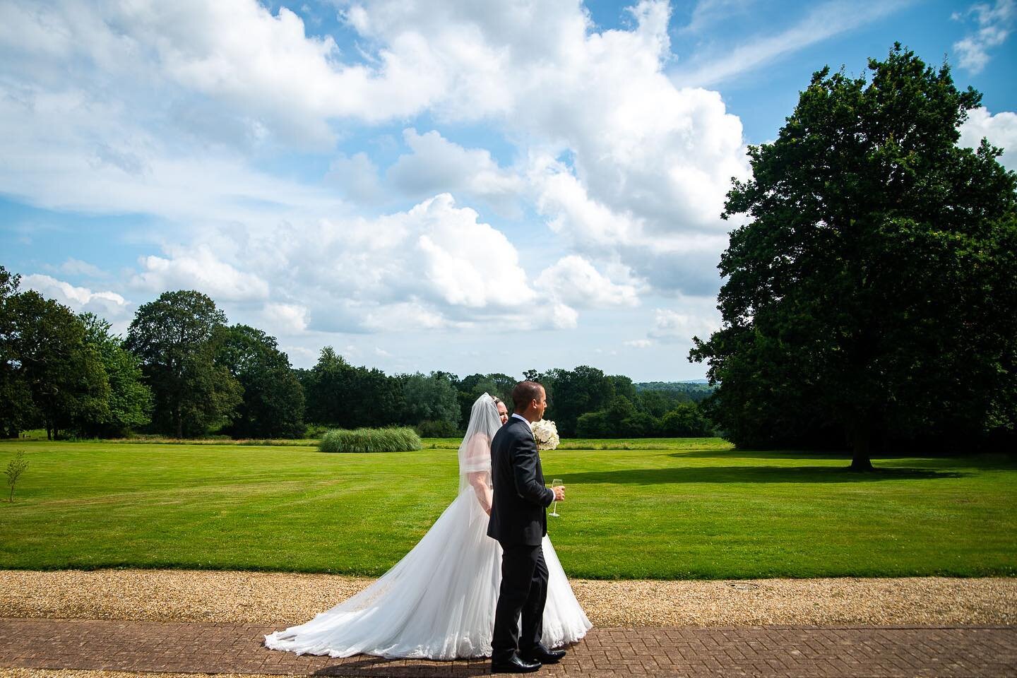 BLUE SKIES // This is England. It might rain in July and be sunny in November, no one knows&hellip; We suggest not worrying and simply looking forward to walking hand in hand with your person on your best day. 

Wedding: S&amp;G, July 2021
Photograph