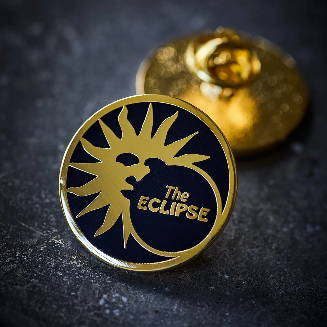The Eclipse Pin Badge showing the back